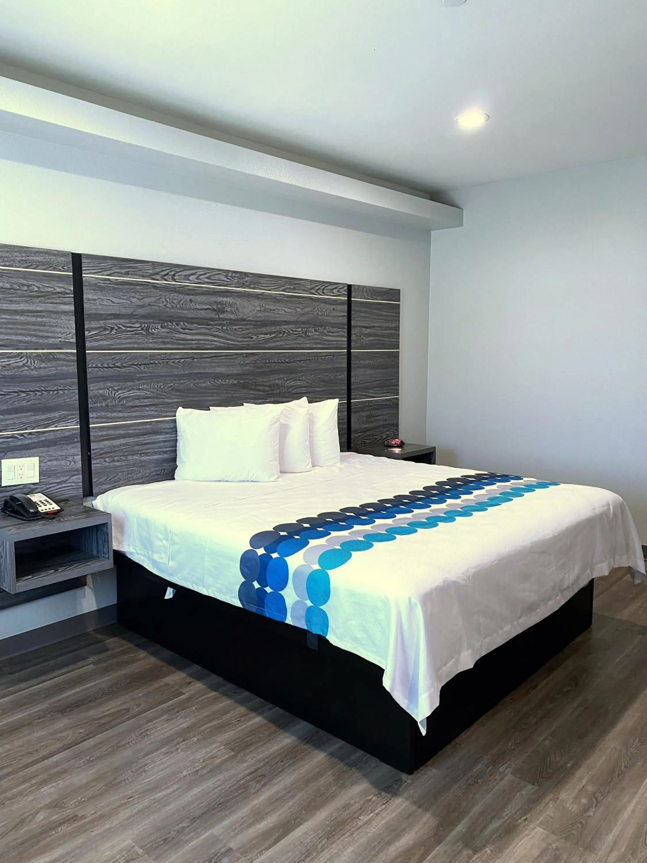 Bed in PALACEINN-ARCOLA