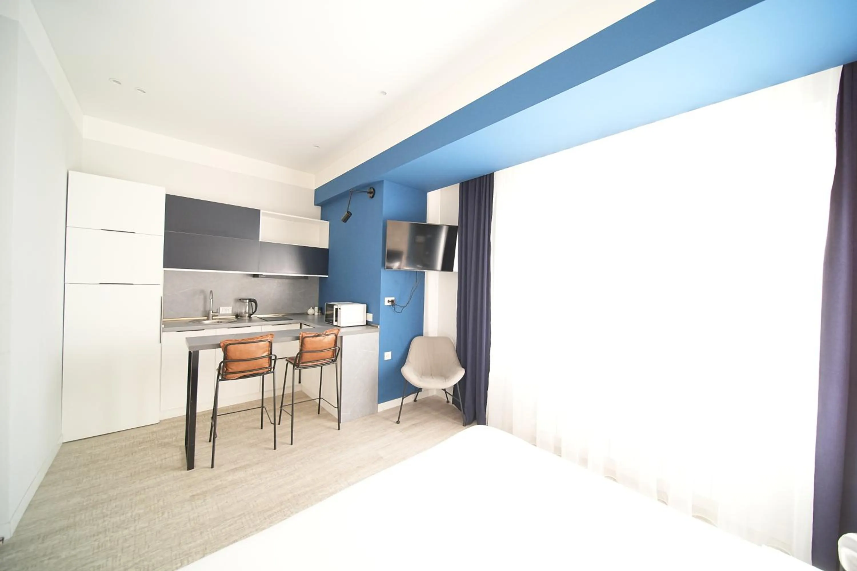 TV and multimedia in Sweet Home Apart-Hotel