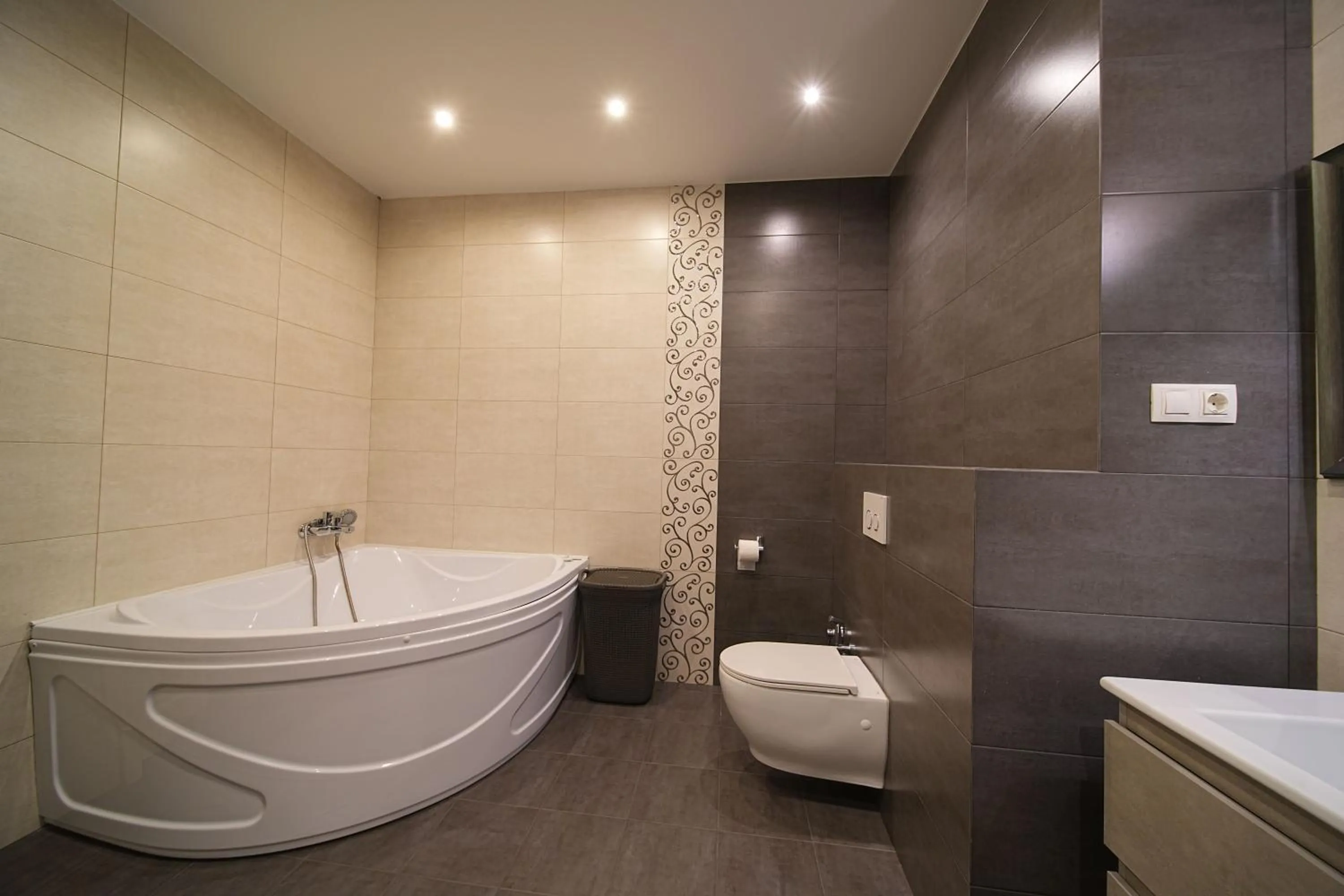 Shower in Sweet Home Apart-Hotel