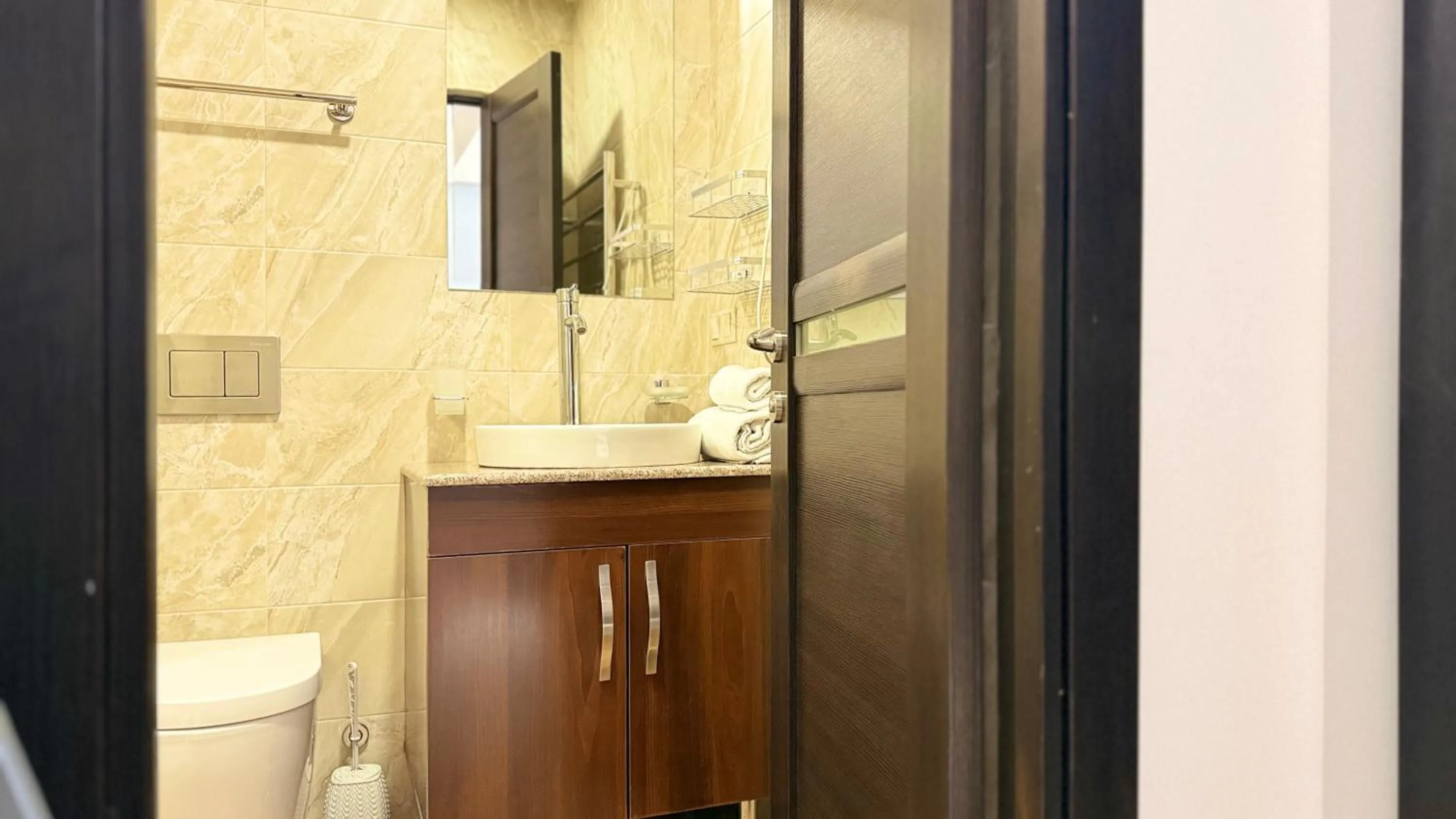 Shower in Sweet Home Apart-Hotel