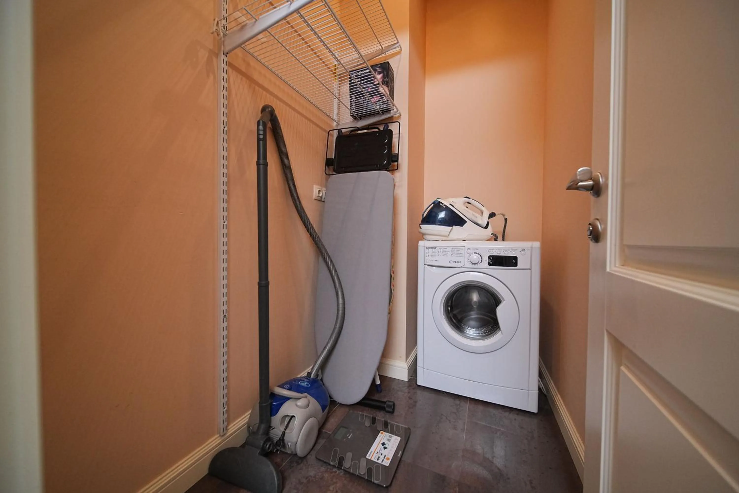 washing machine in Sweet Home Apart-Hotel