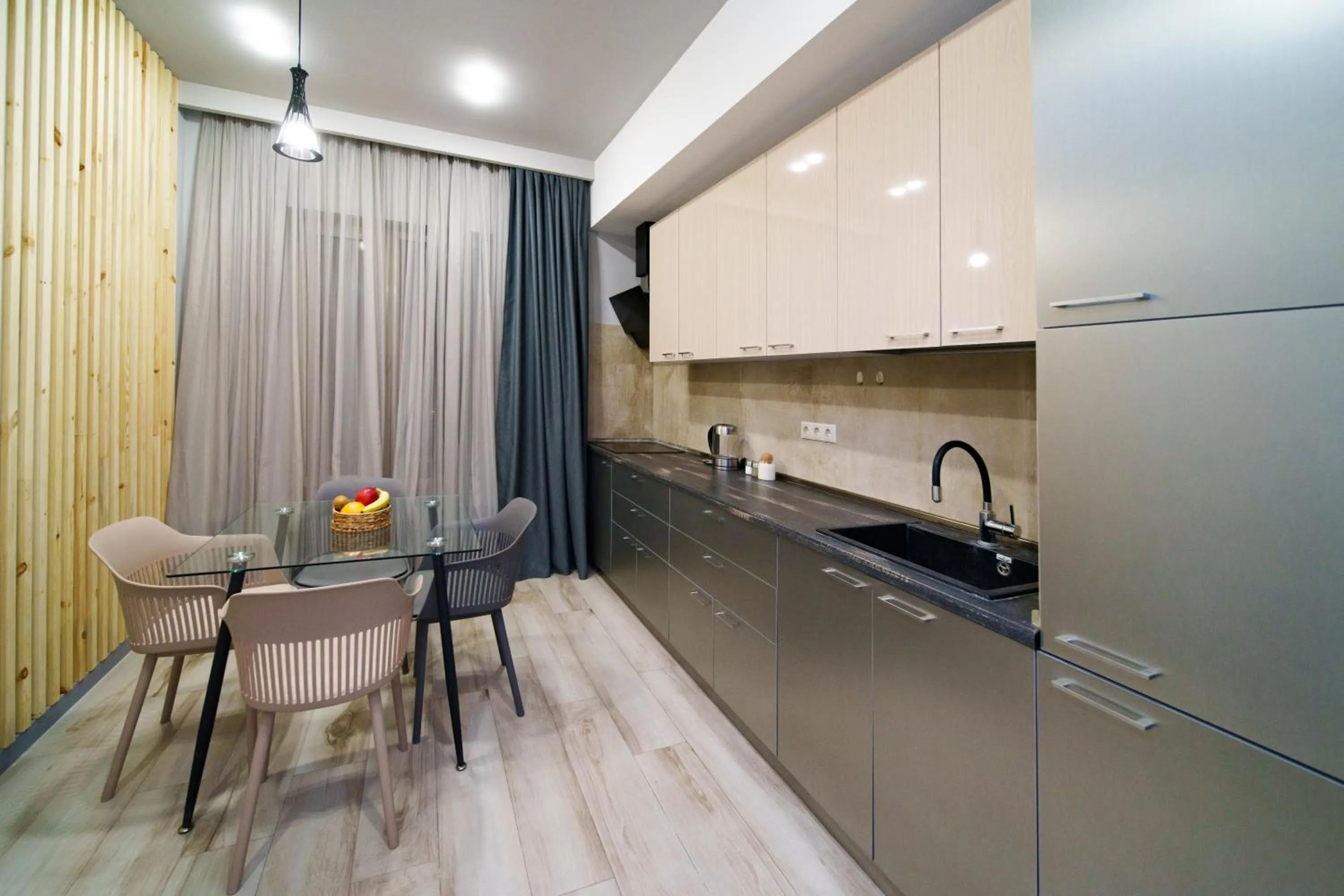 Kitchen or kitchenette in Sweet Home Apart-Hotel