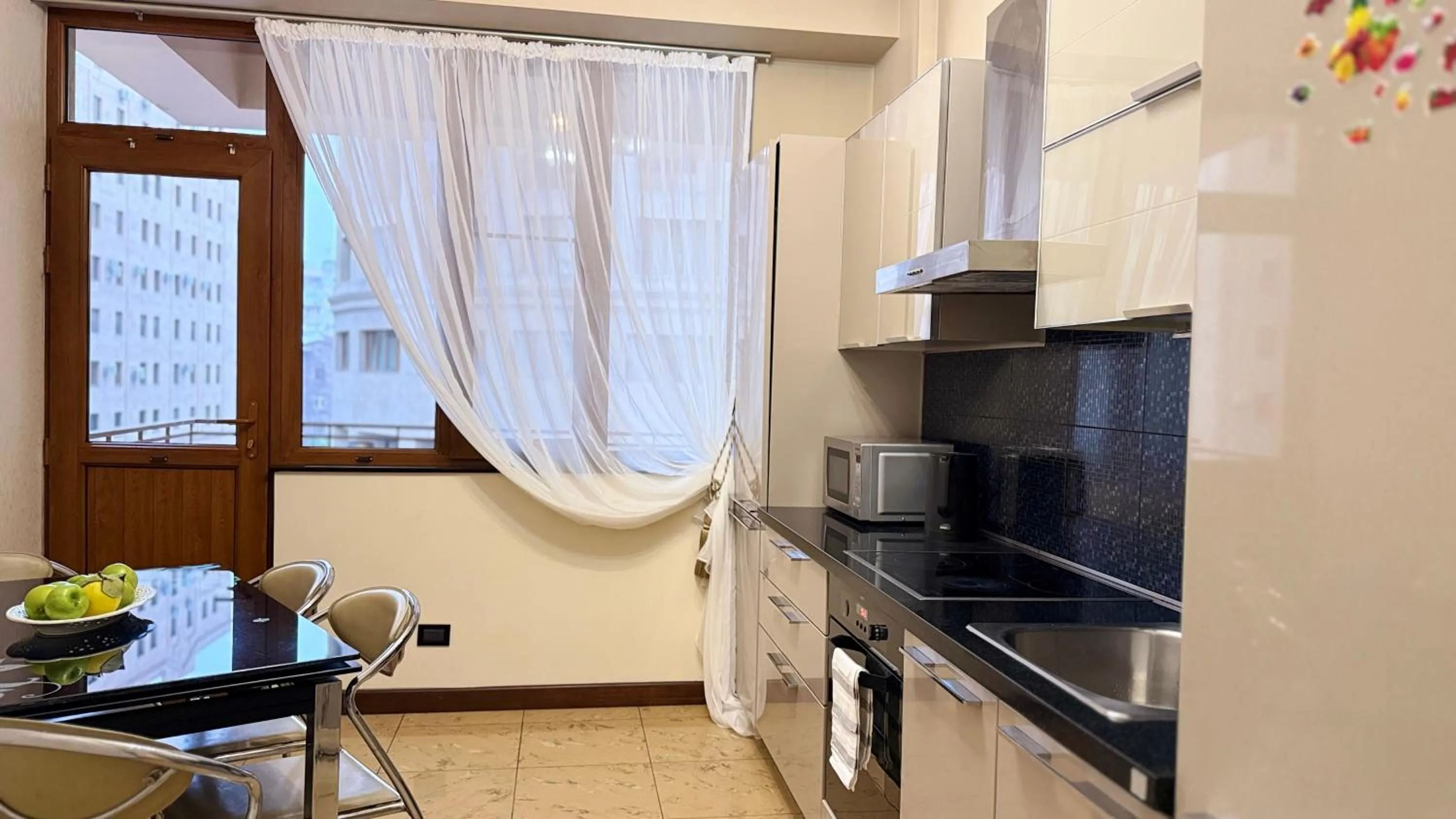 Kitchen or kitchenette in Sweet Home Apart-Hotel
