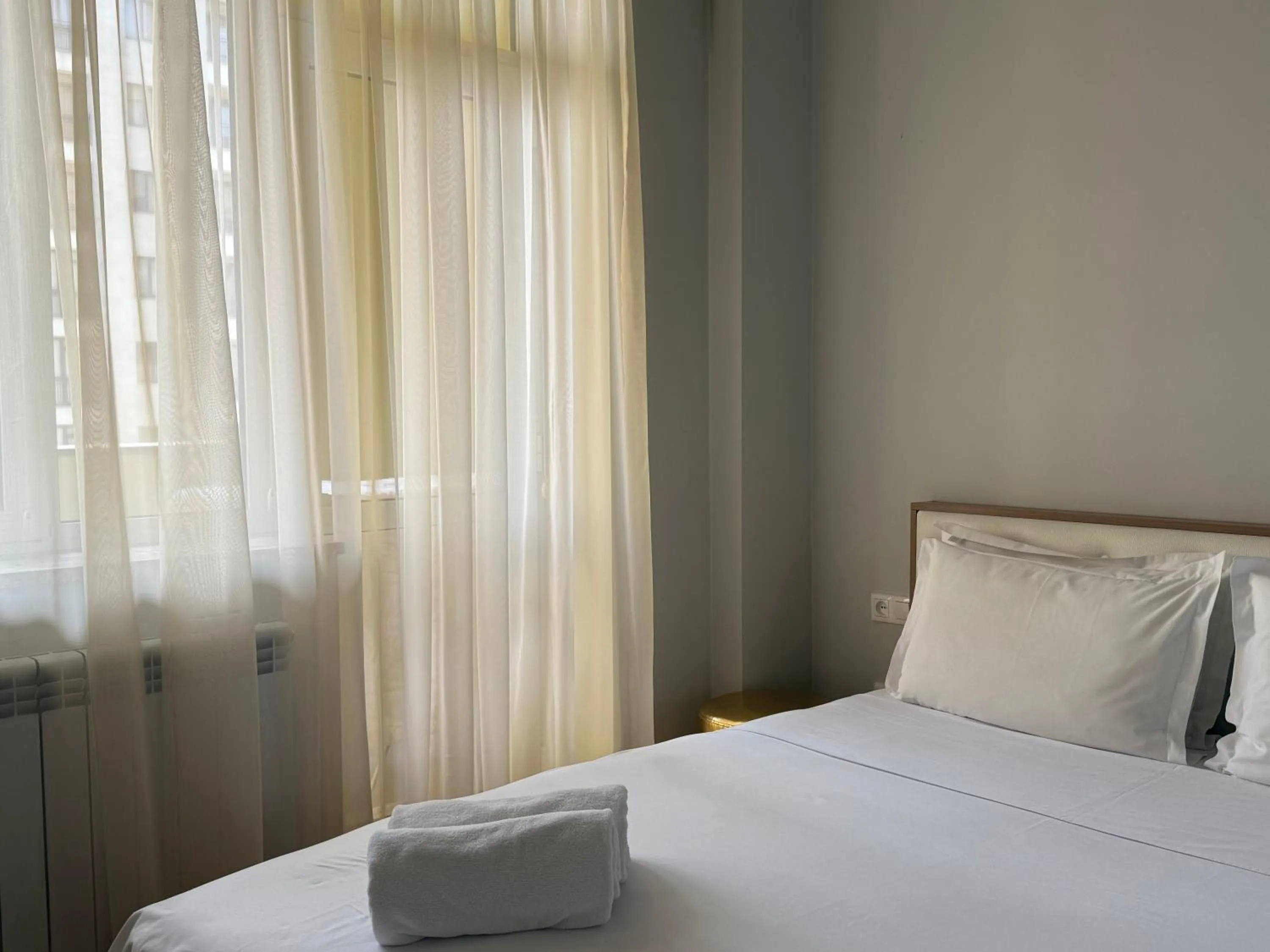 Bed in Sweet Home Apart-Hotel