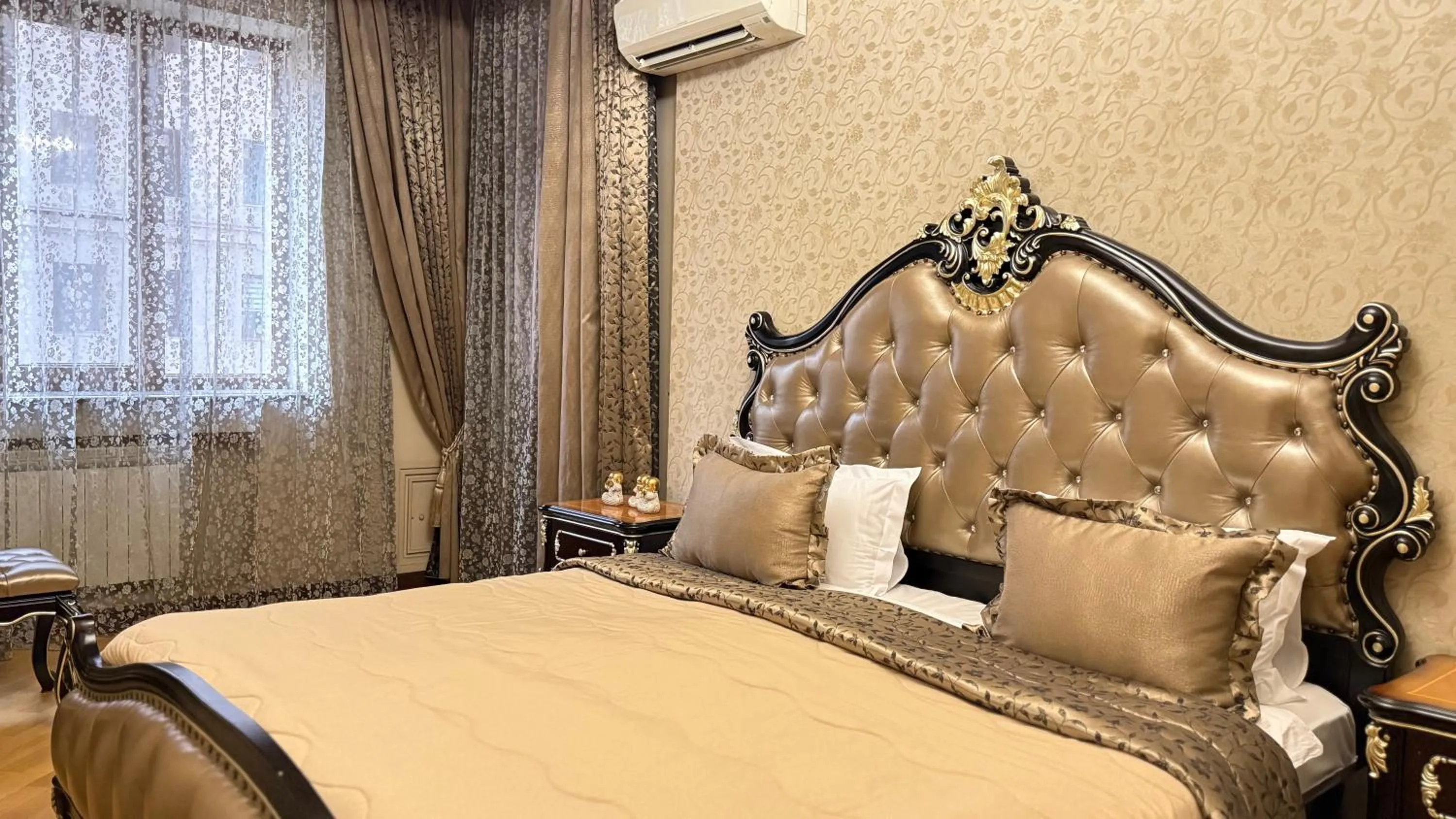 Bed in Sweet Home Apart-Hotel