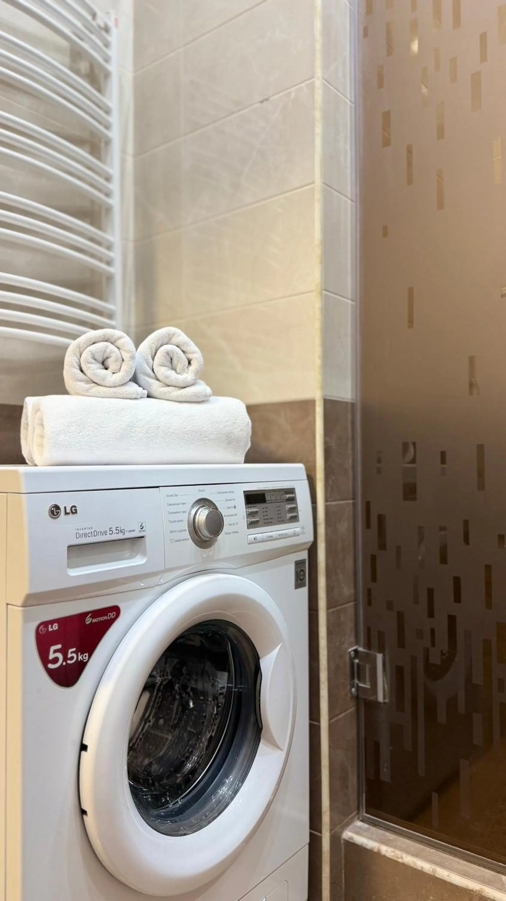 washing machine in Sweet Home Apart-Hotel