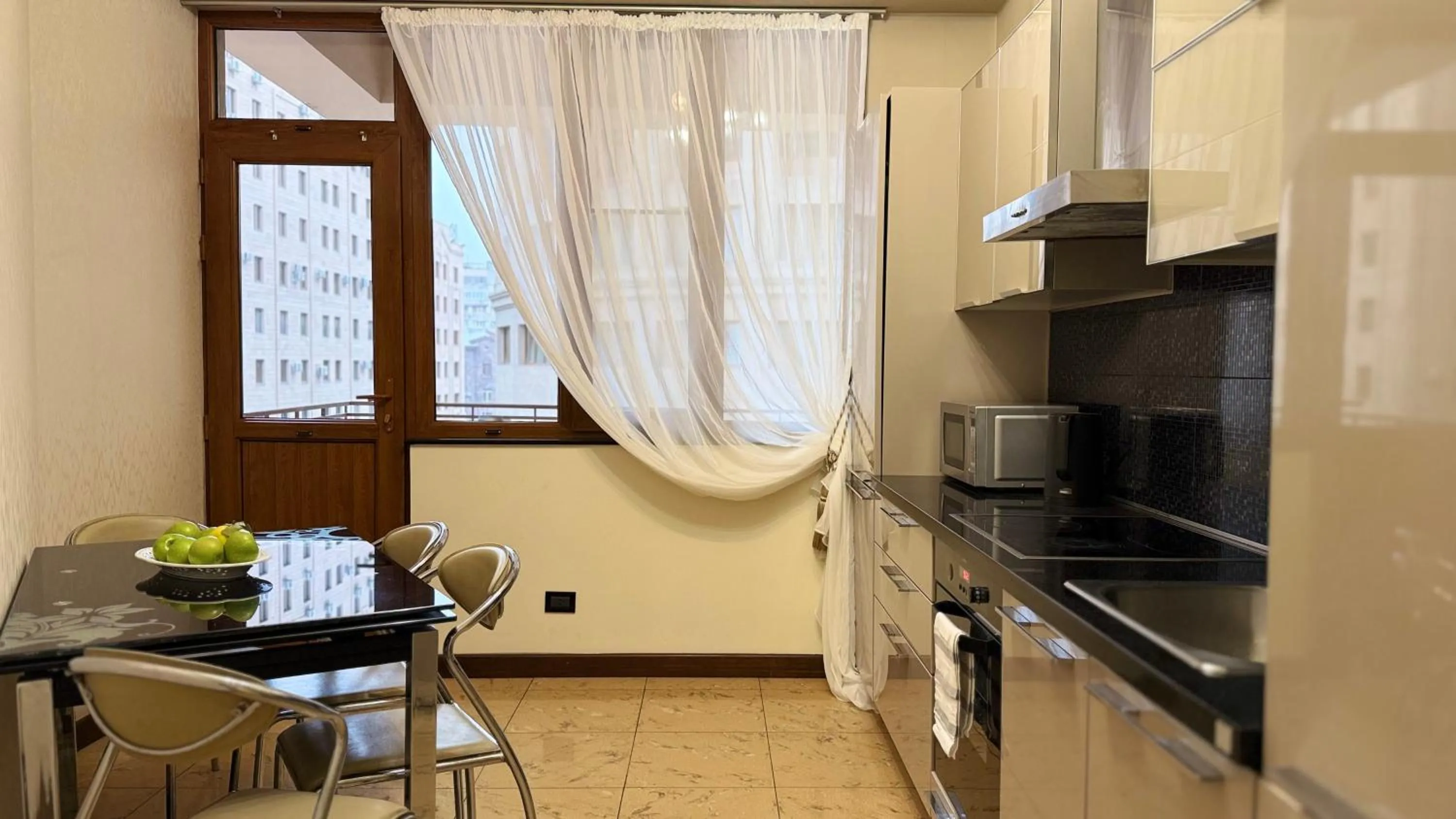 Kitchen or kitchenette in Sweet Home Apart-Hotel