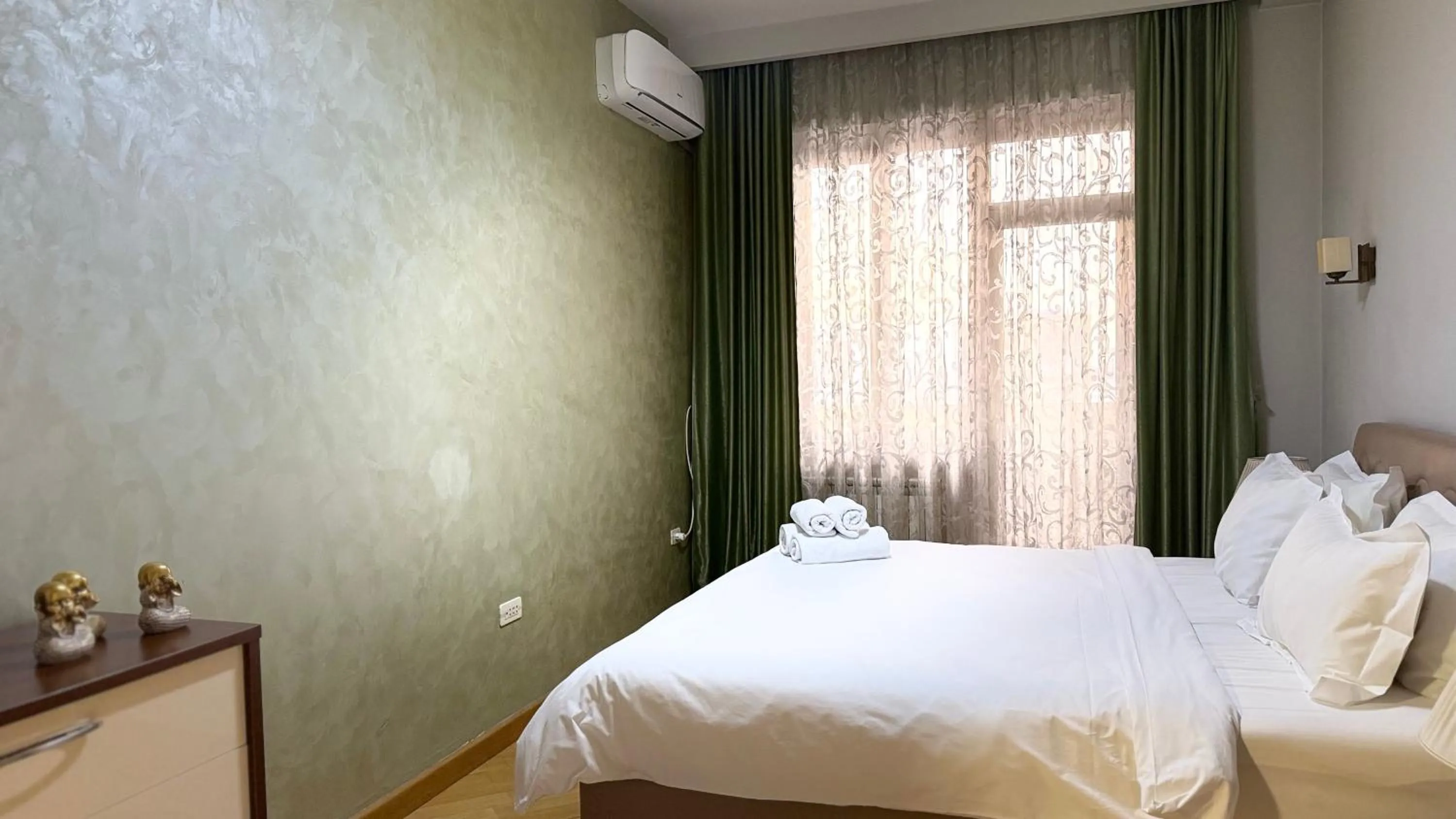 Bed in Sweet Home Apart-Hotel