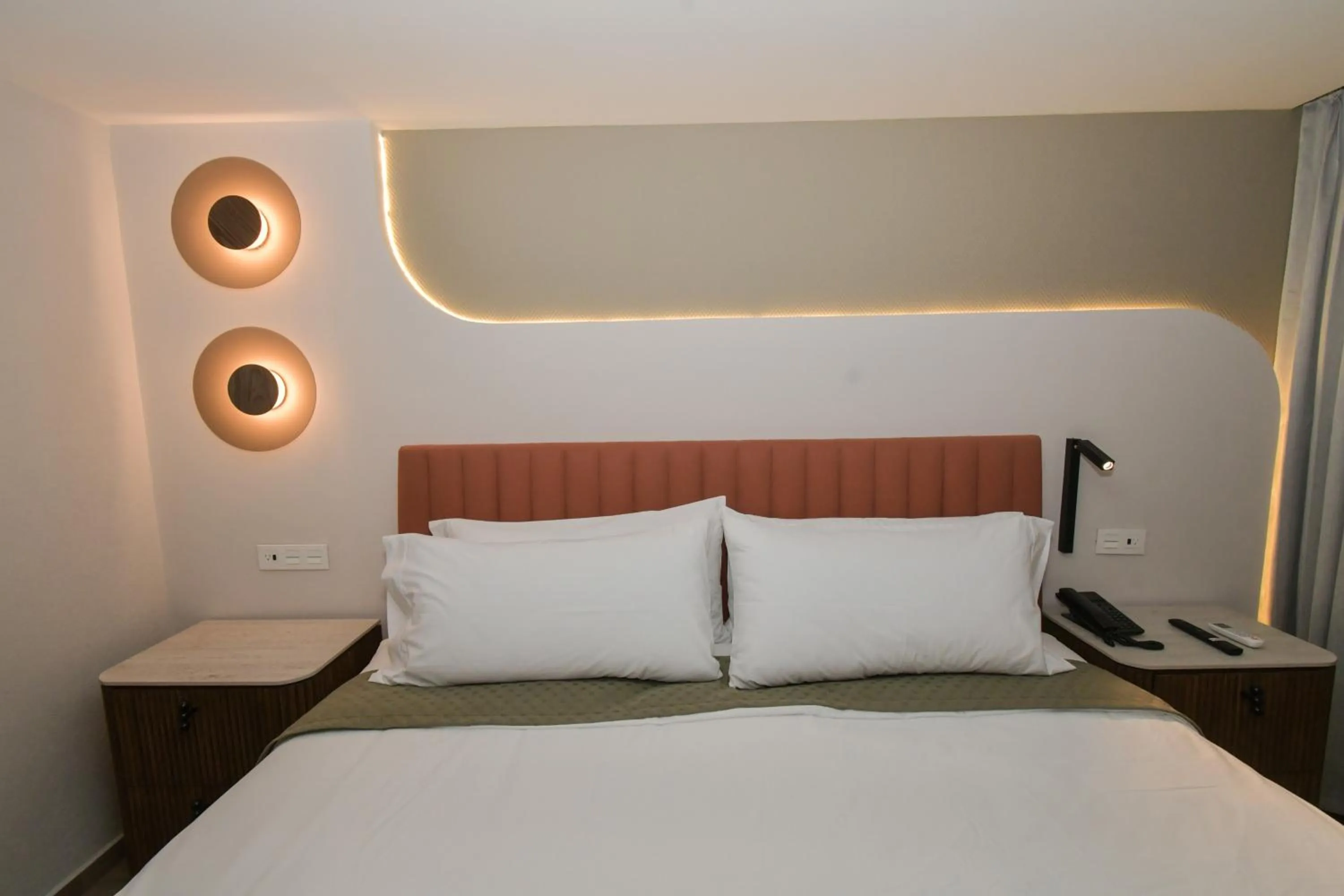 Bed in Expo Satelite 2750 Hotel & Suites