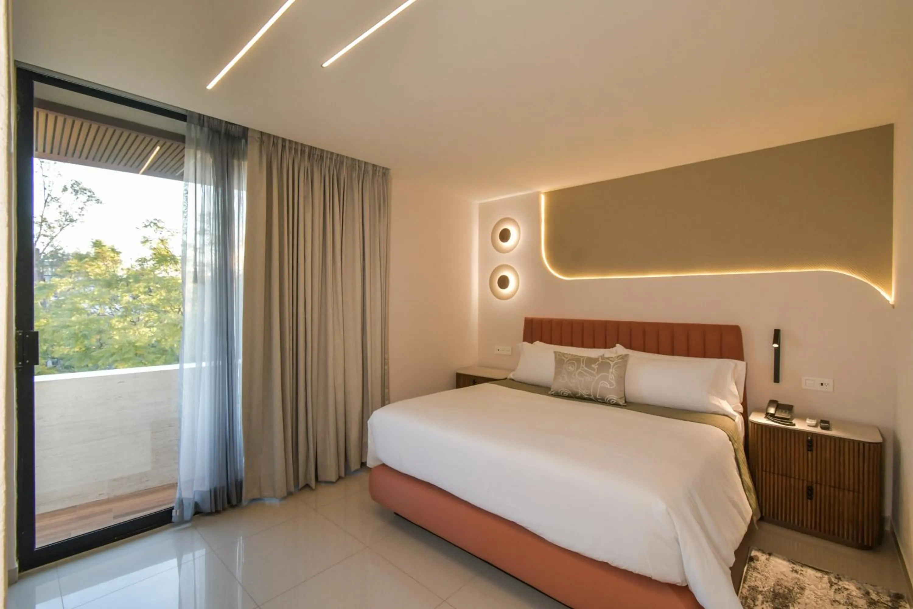 Bed in Expo Satelite 2750 Hotel & Suites