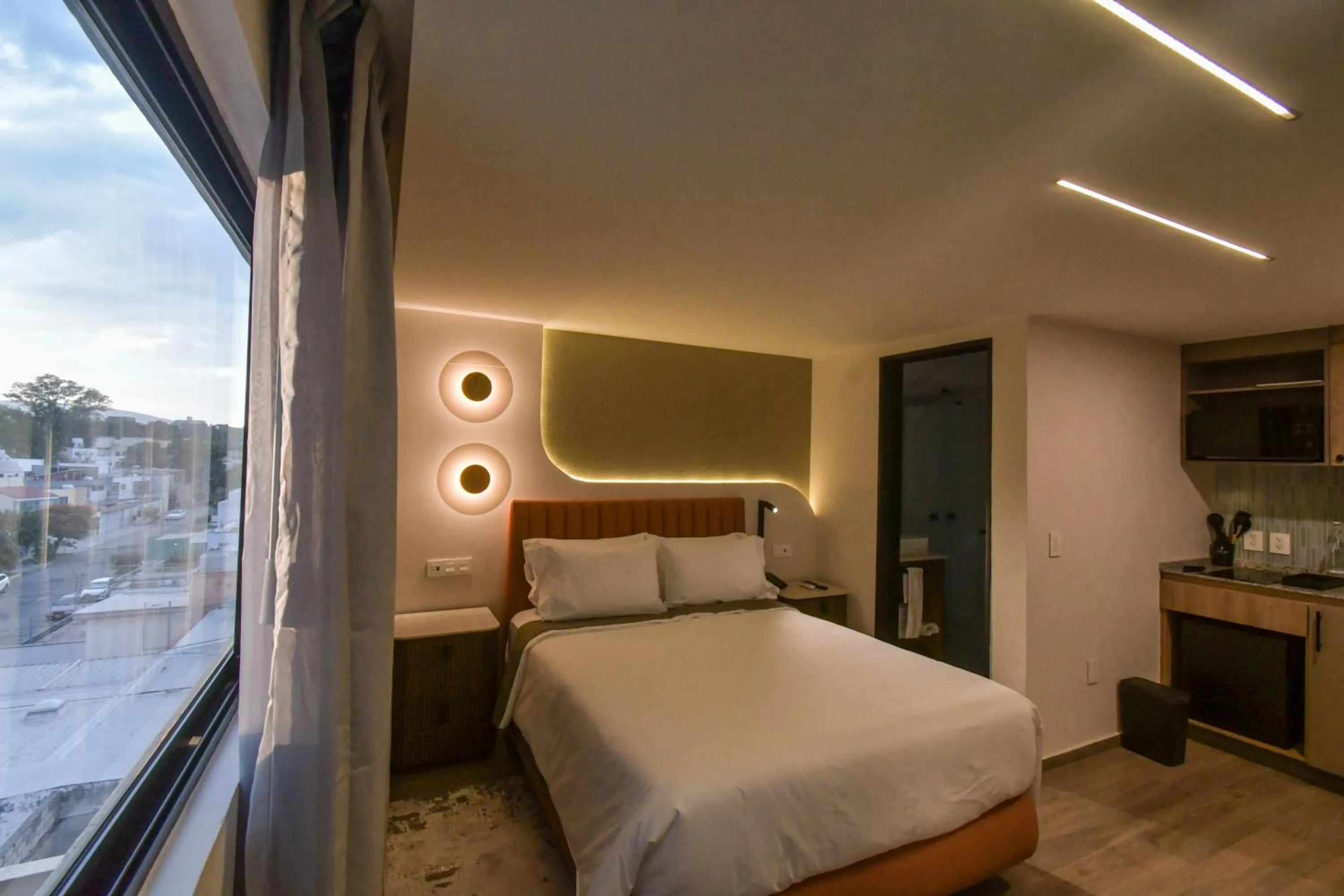 Bed in Expo Satelite 2750 Hotel & Suites