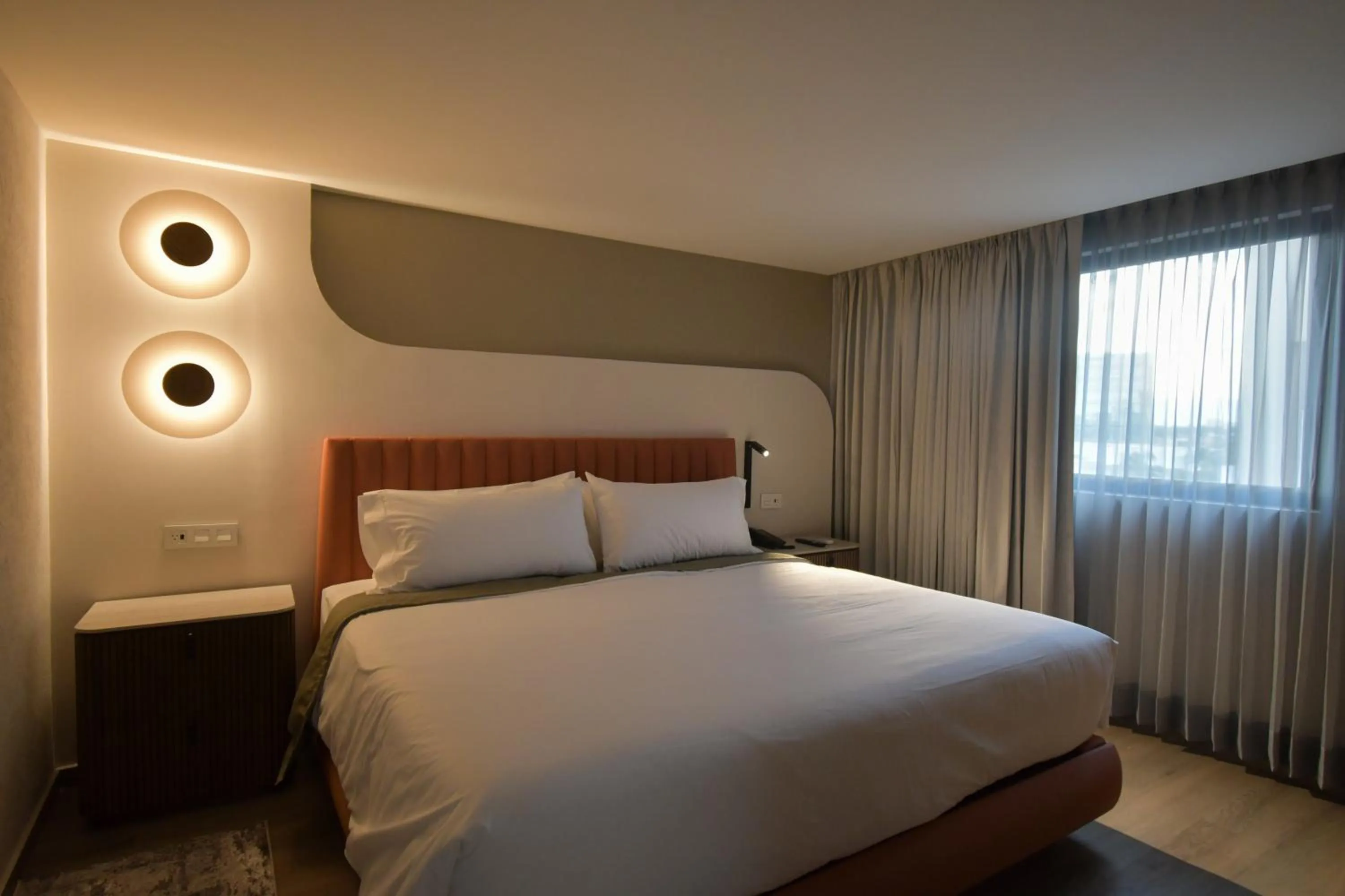 Bed in Expo Satelite 2750 Hotel & Suites