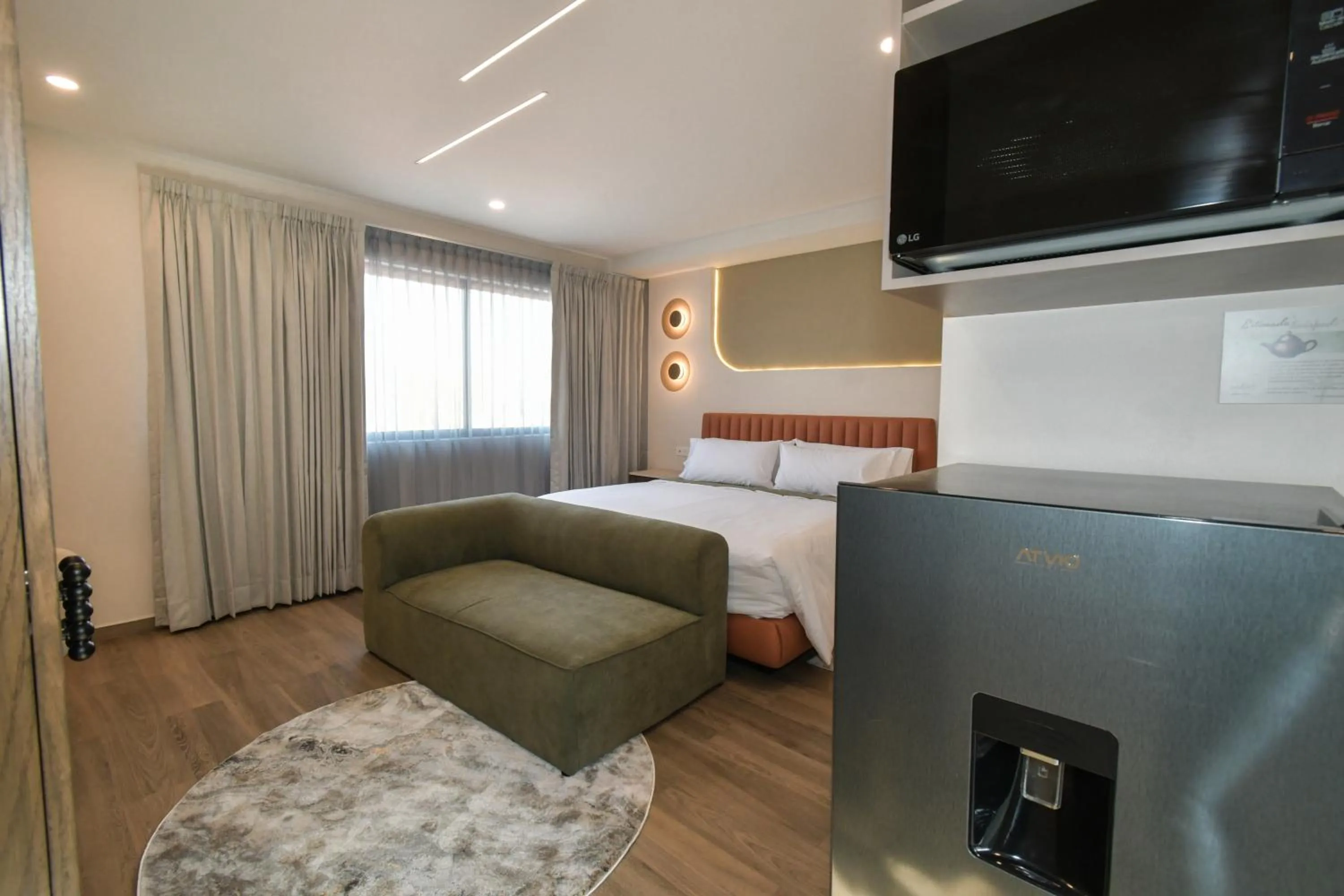 Bed in Expo Satelite 2750 Hotel & Suites