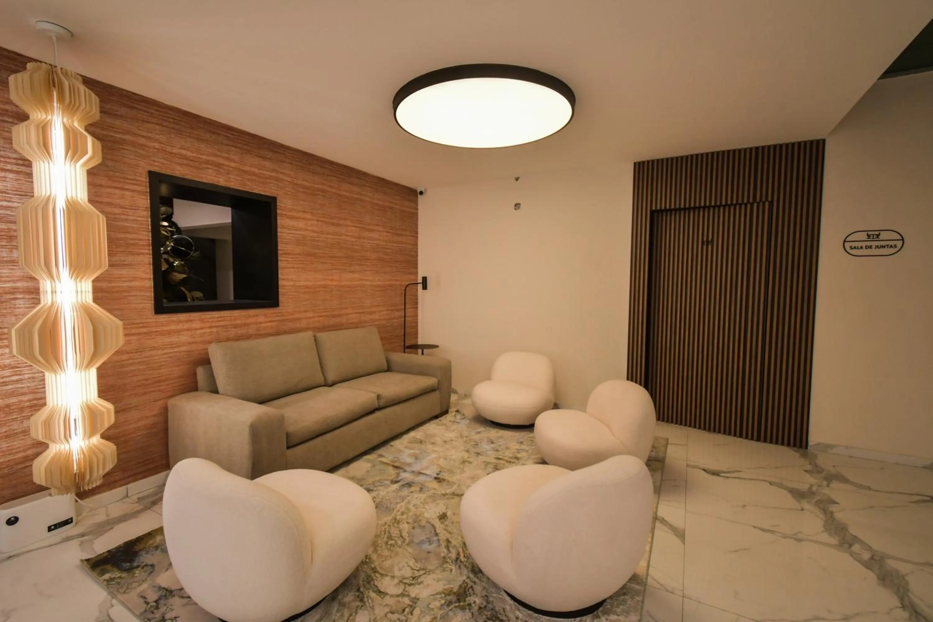 Living room in Expo Satelite 2750 Hotel & Suites