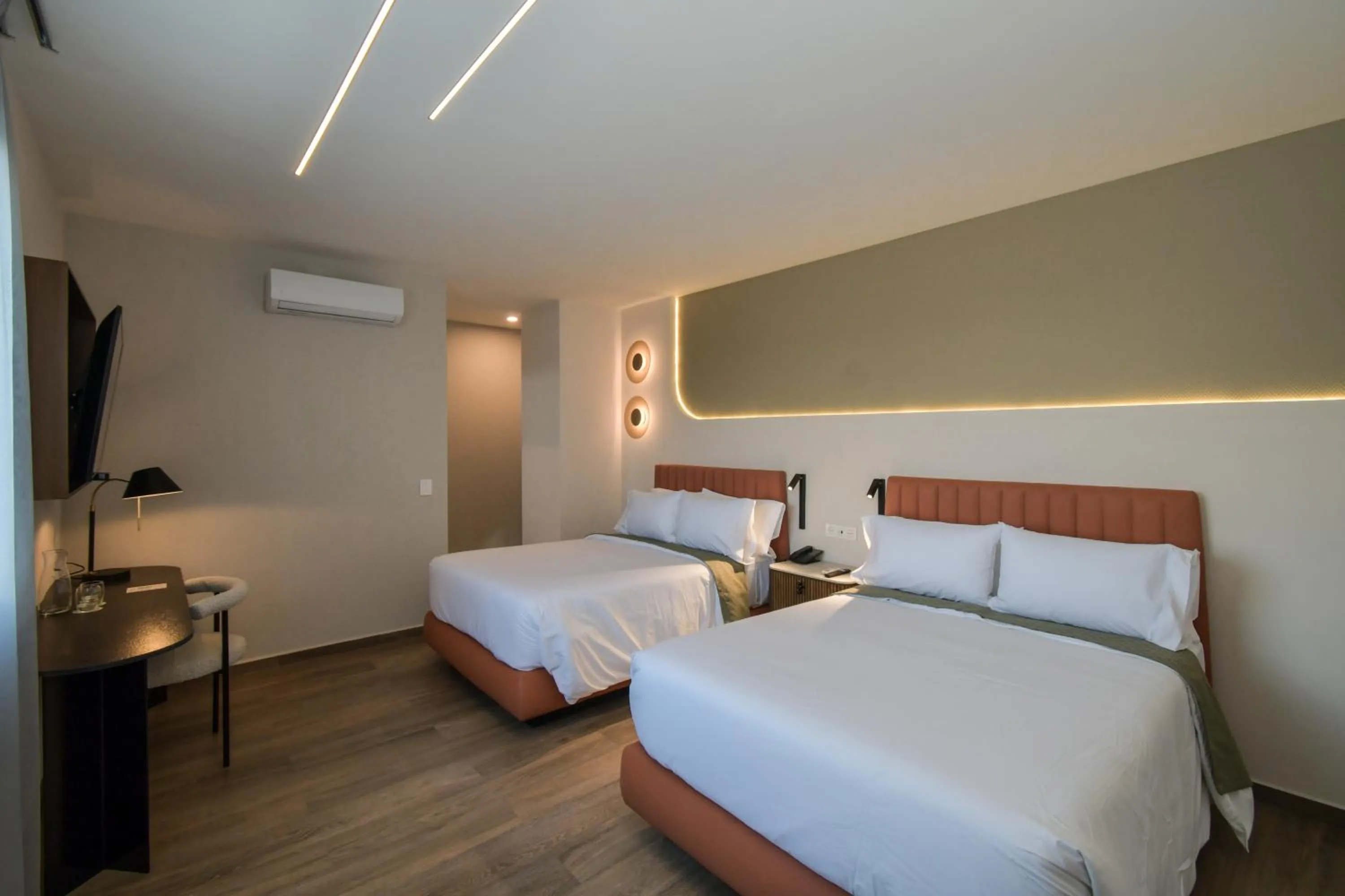 Bed in Expo Satelite 2750 Hotel & Suites