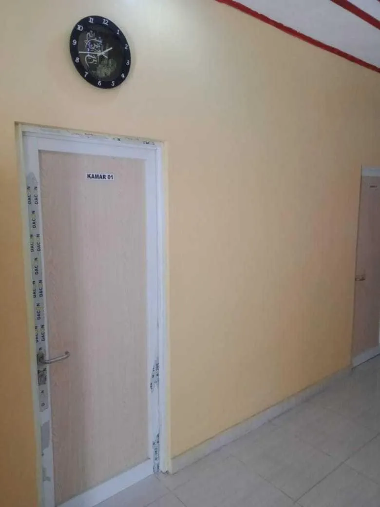 Facade/entrance in Hotel O Wisma Nadira Near SPBU PT. Trijaya Pugung PENENGAHAN