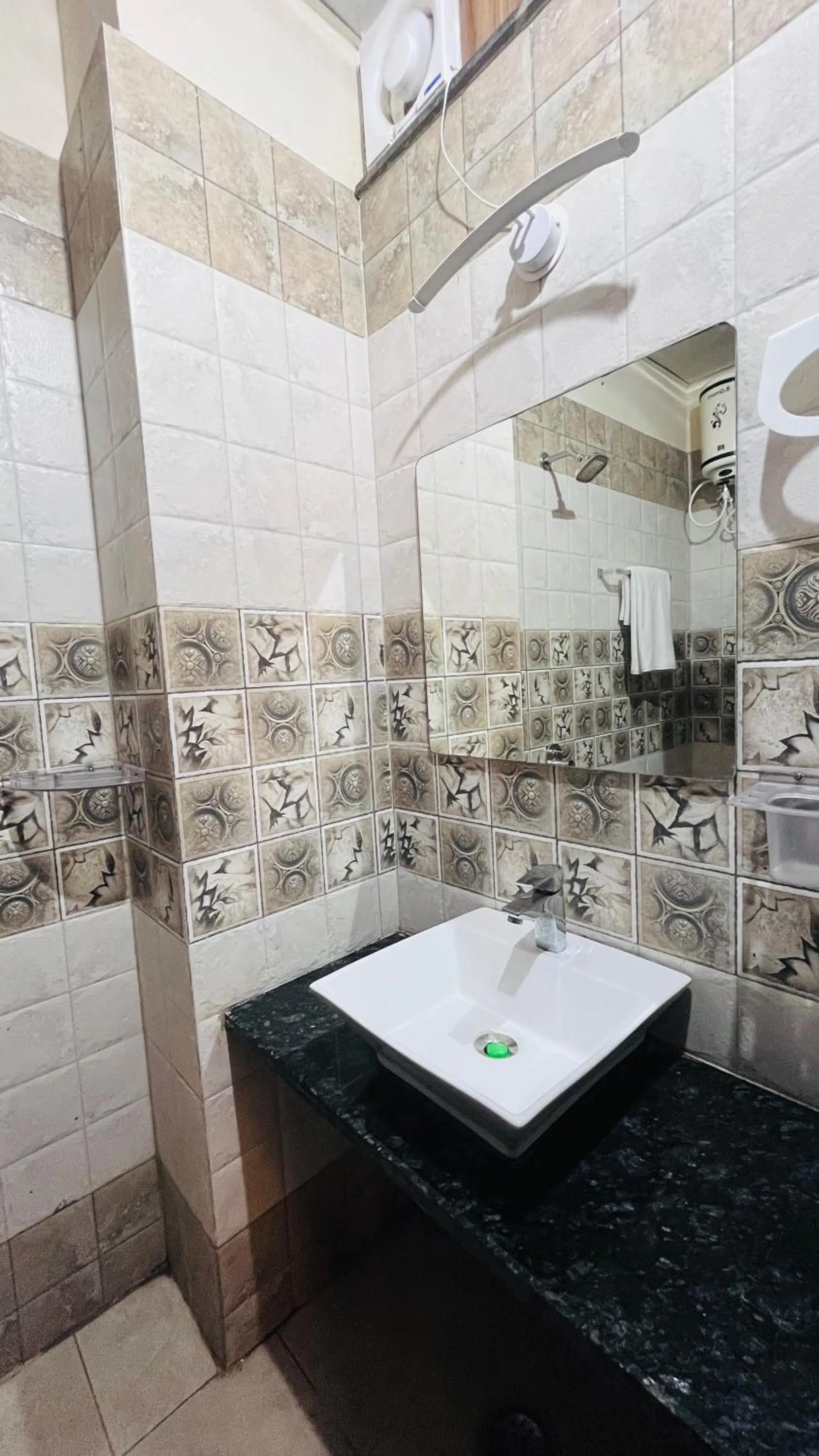 Shower in Hotel Hallmark By THC Group