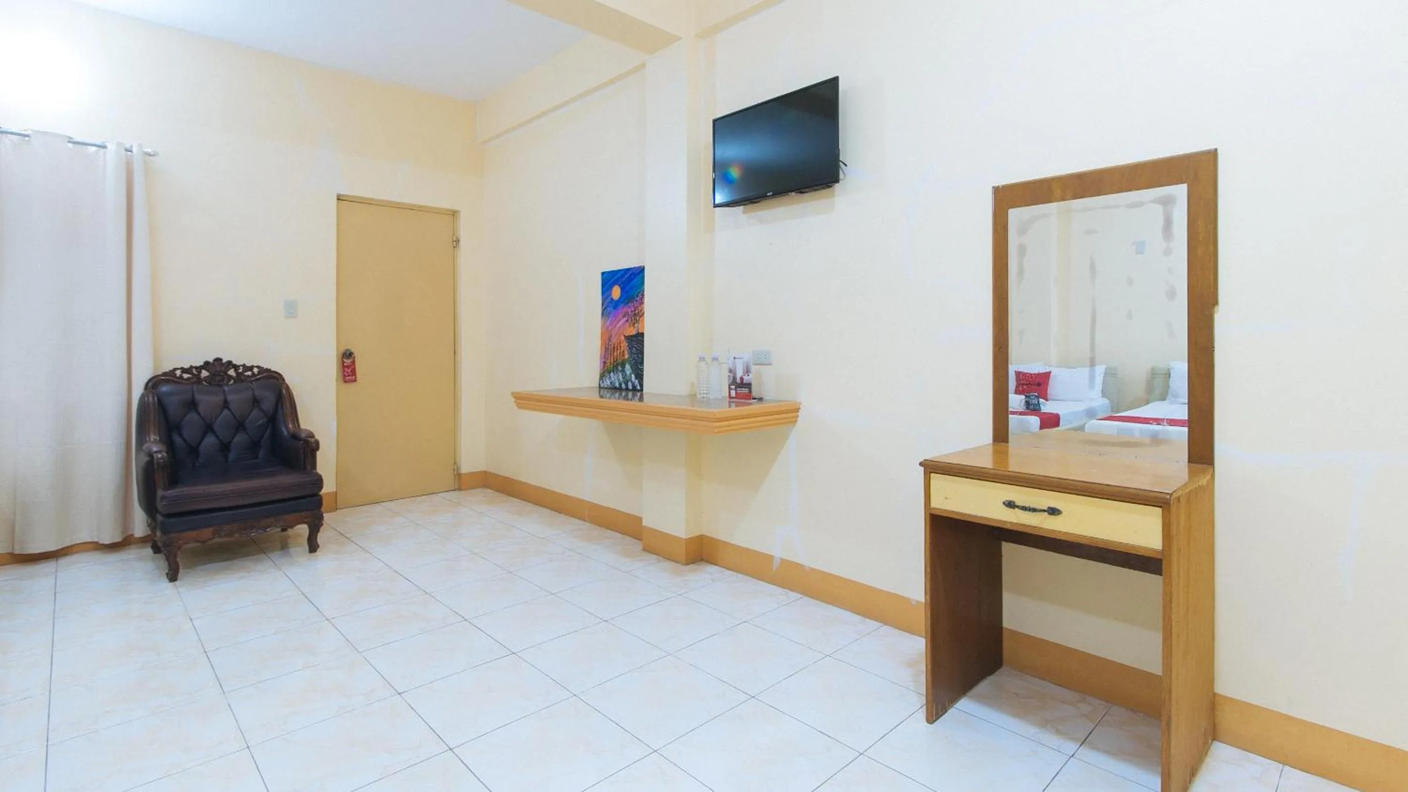 TV and multimedia in RedDoorz @ Goldland Spring Resort Urdaneta City