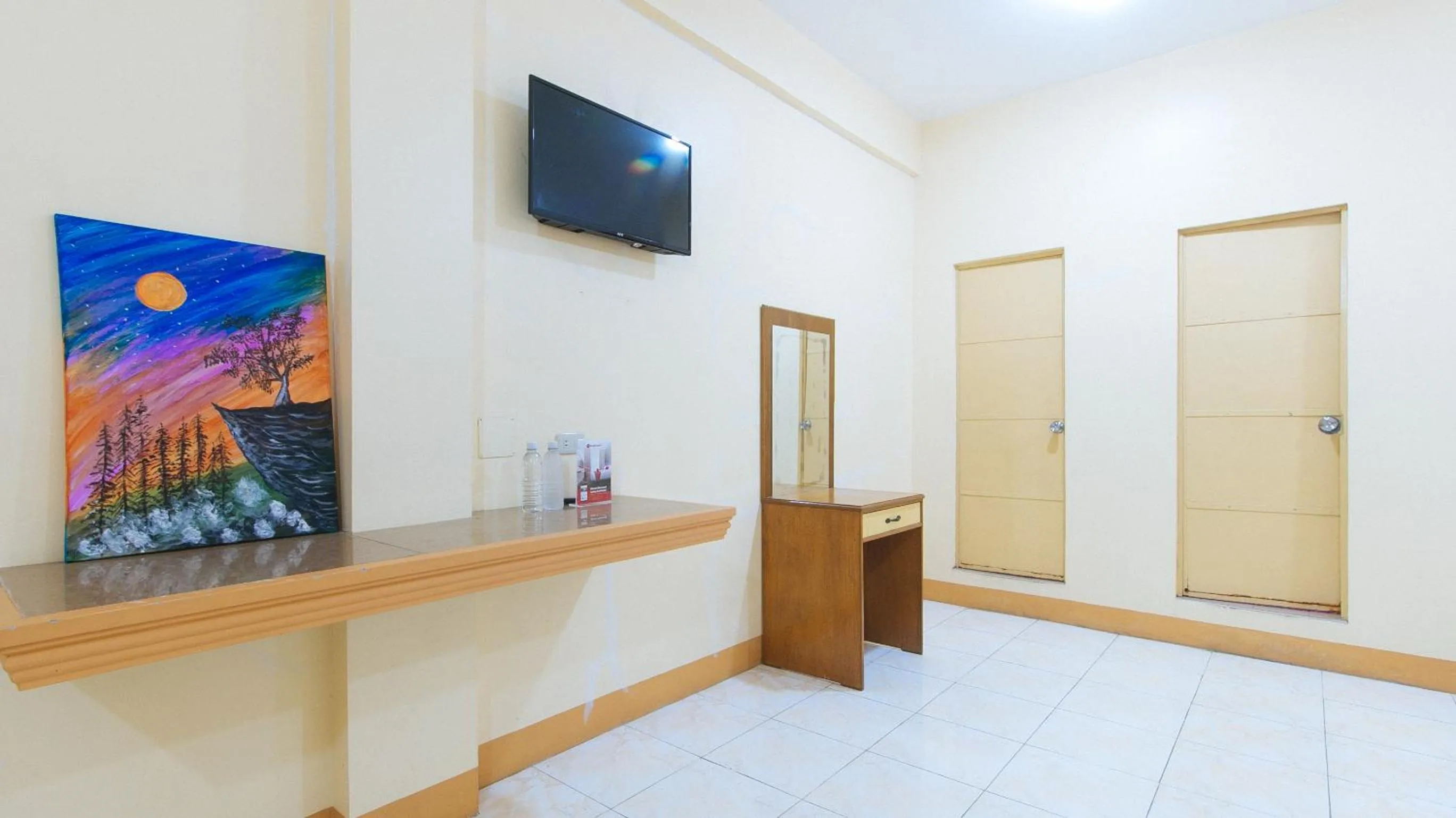 TV and multimedia in RedDoorz @ Goldland Spring Resort Urdaneta City