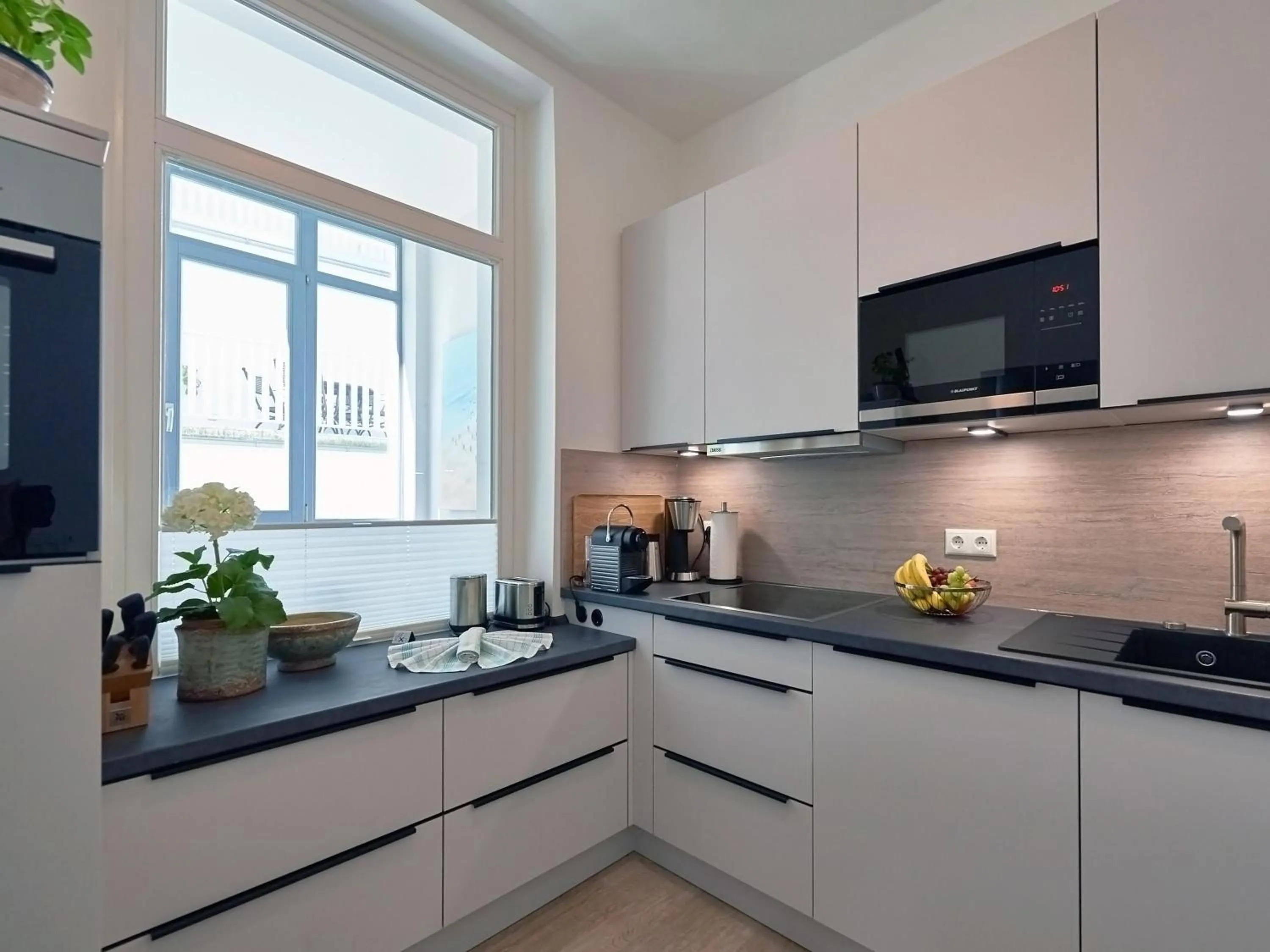 Kitchen or kitchenette in Ferienwohnung AMAPOLA - Villa Odin