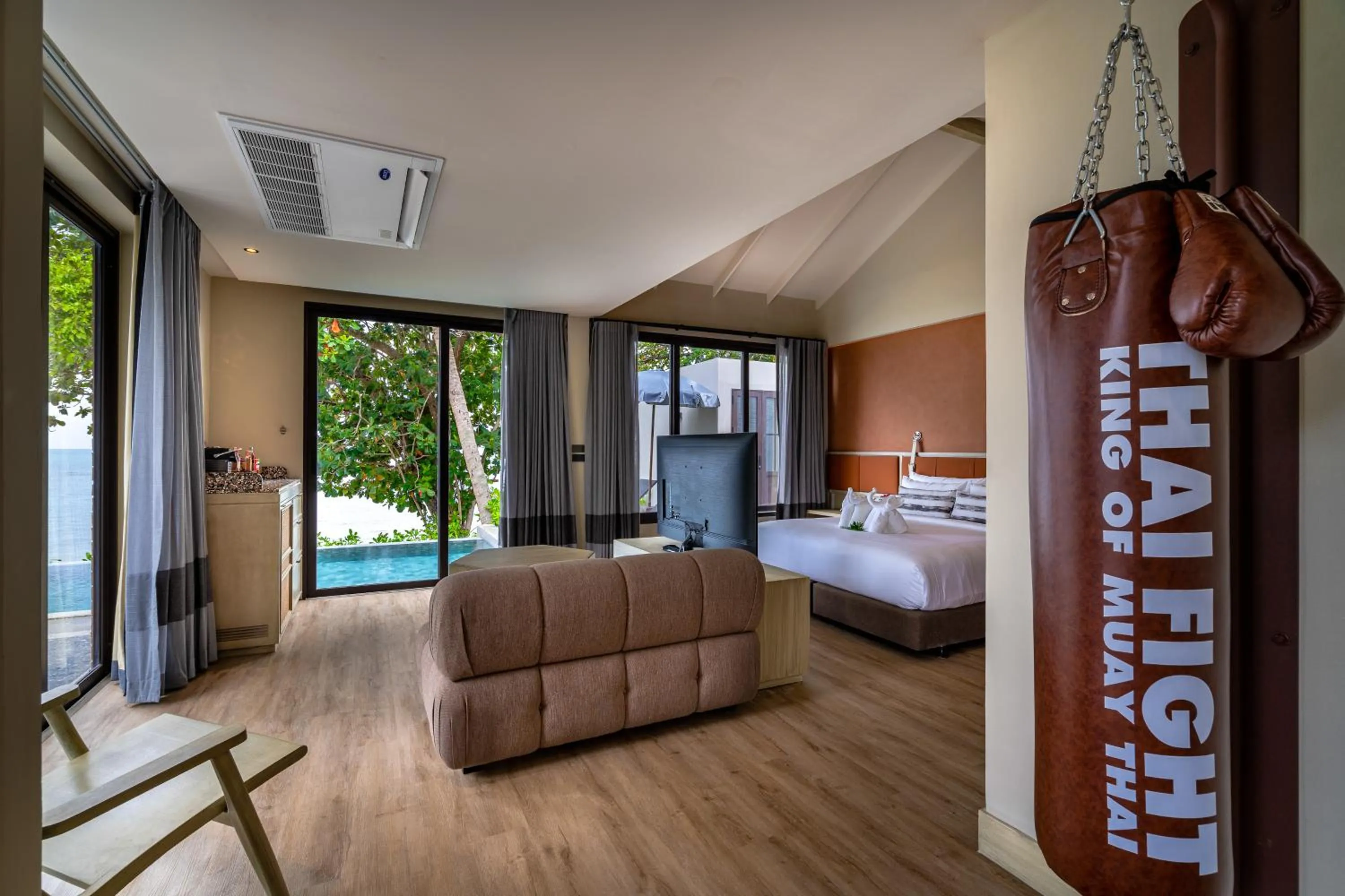 Seating area, Bed in Thai Fight Hotel