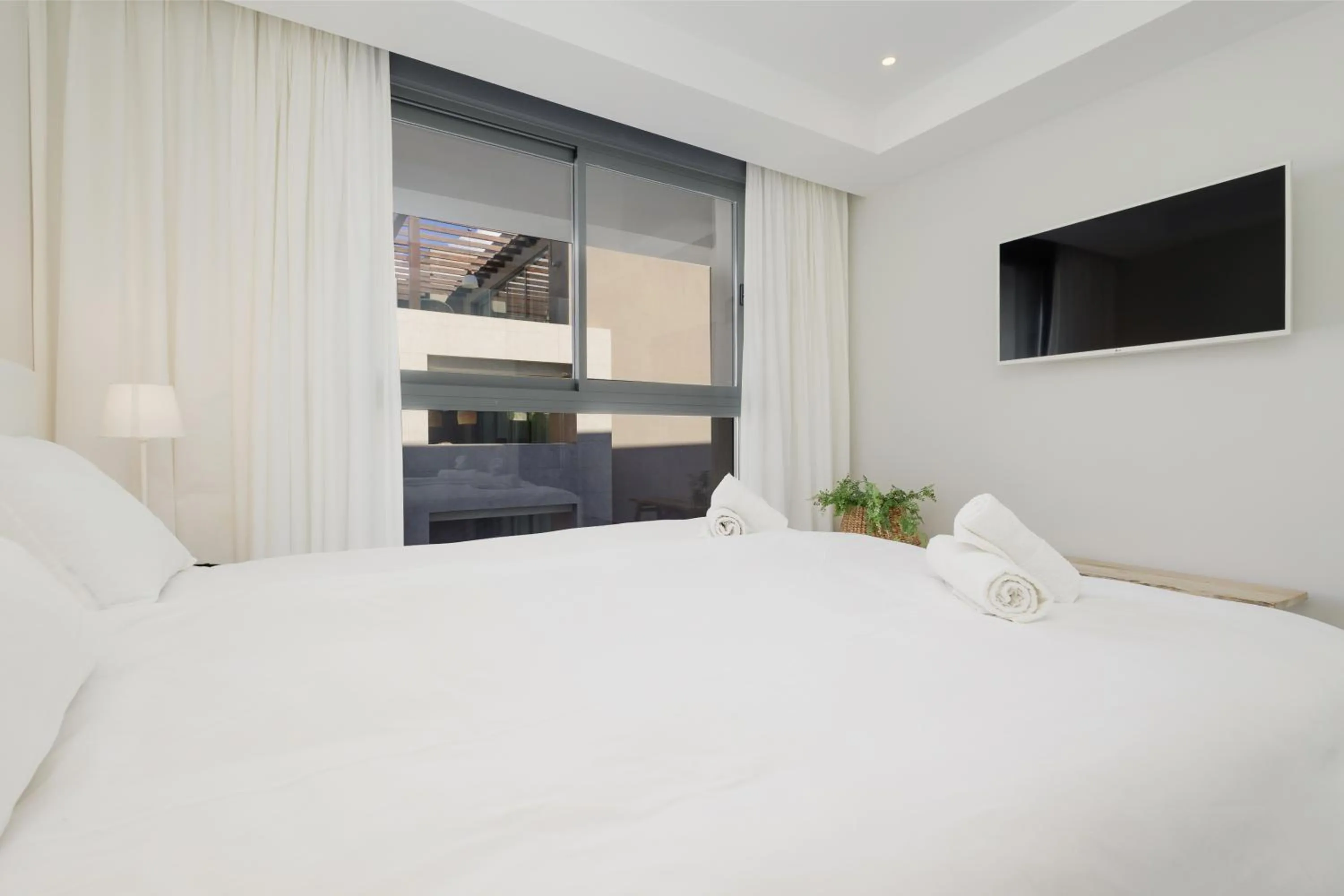 Bed in Luxury holiday apartment with 2 bedrooms in Cancelada