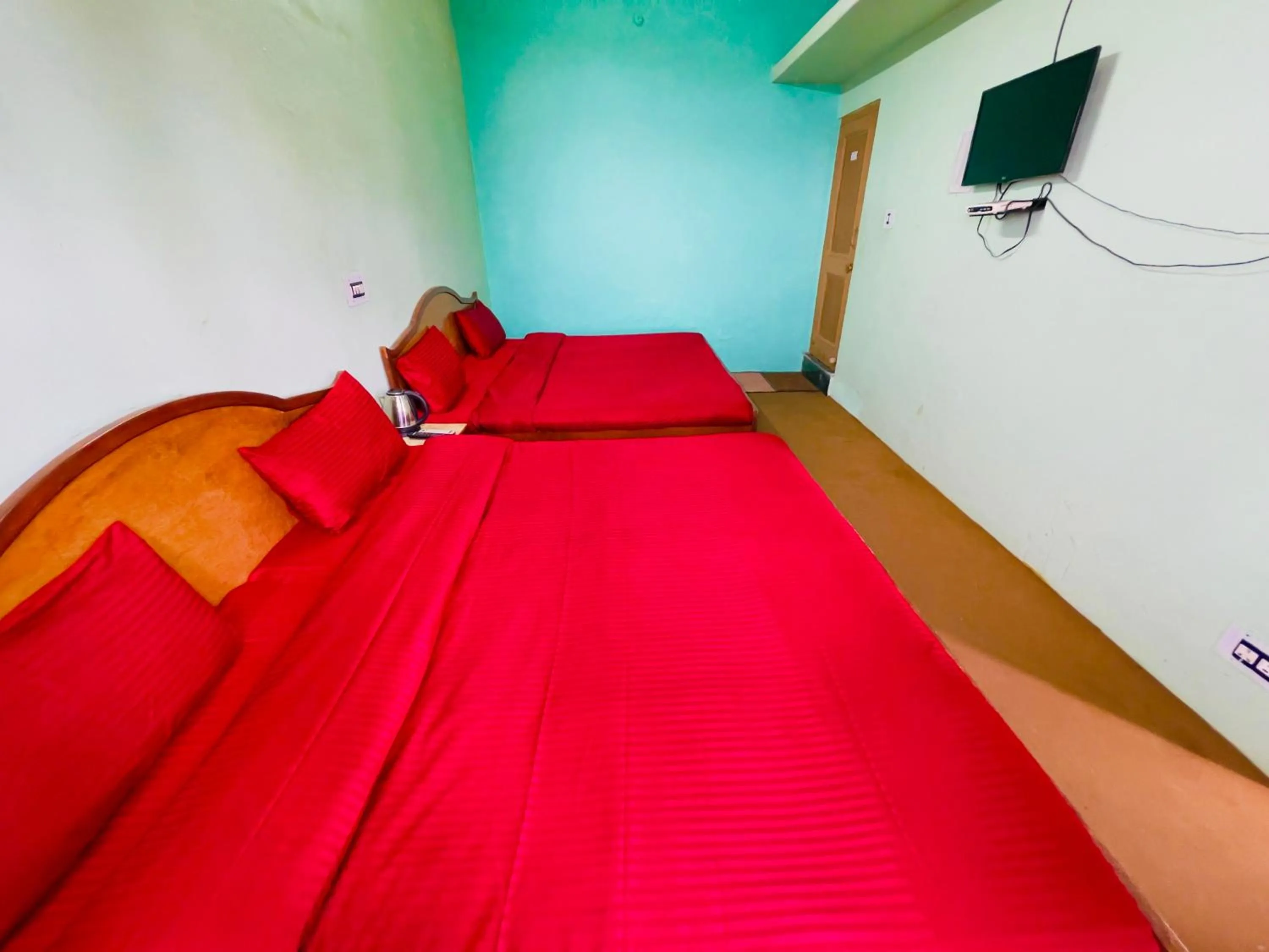 TV and multimedia, Bed in Grand view lodge and Restaurant Dharamshala - Partial Prepayment required to confirm booking