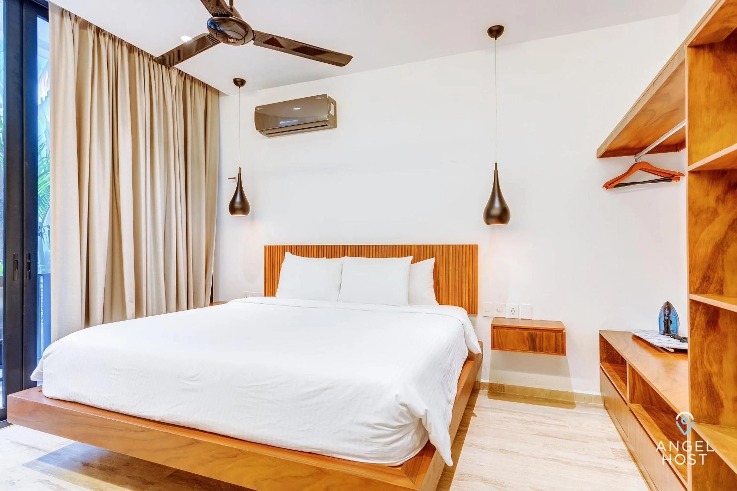 Photo of the whole room, Bed in Chic Condotel with Roof Pool 10-Min Walk to Beach