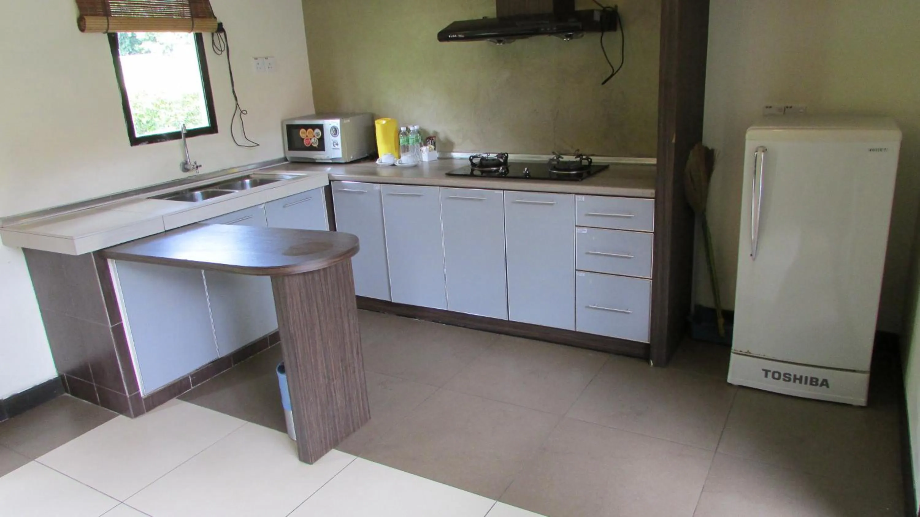 Kitchen or kitchenette in Hotel Felda Residence Hot Springs