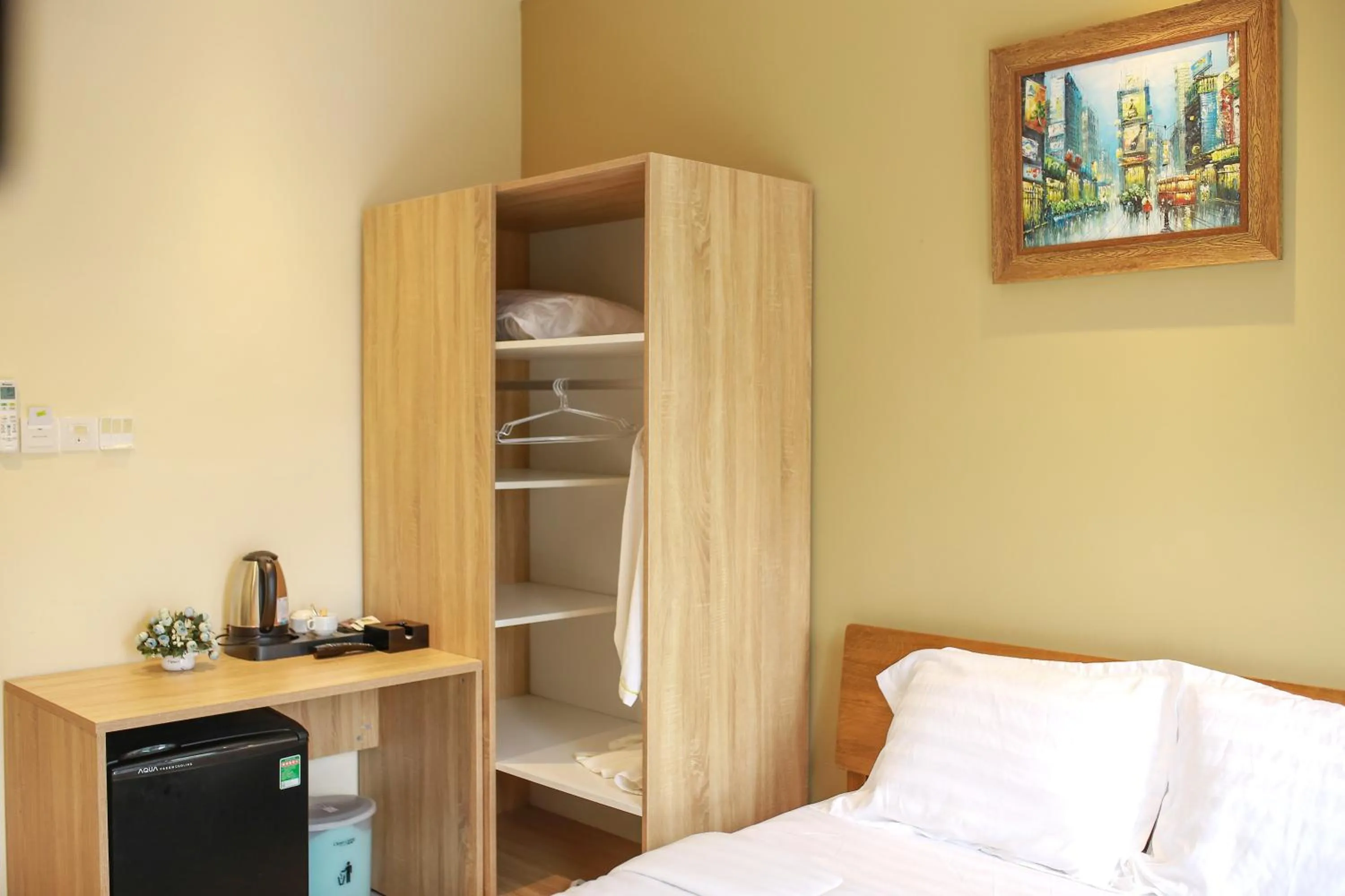 wardrobe, Bed in The Bok Hotel Grand World - by GoGo Phú Quốc