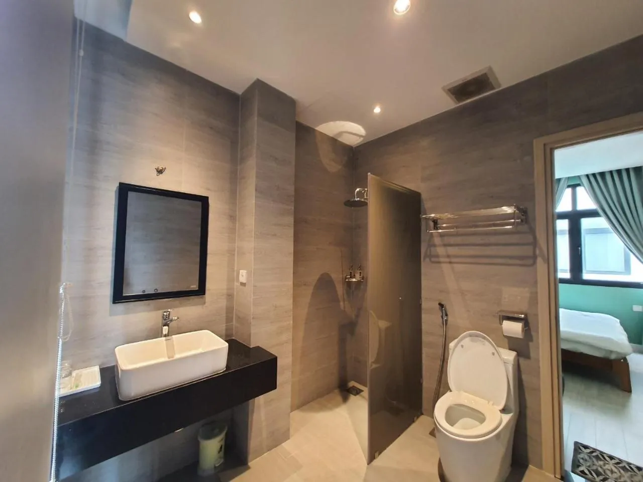 Shower, Bed in The Bok Hotel Grand World - by GoGo Phú Quốc