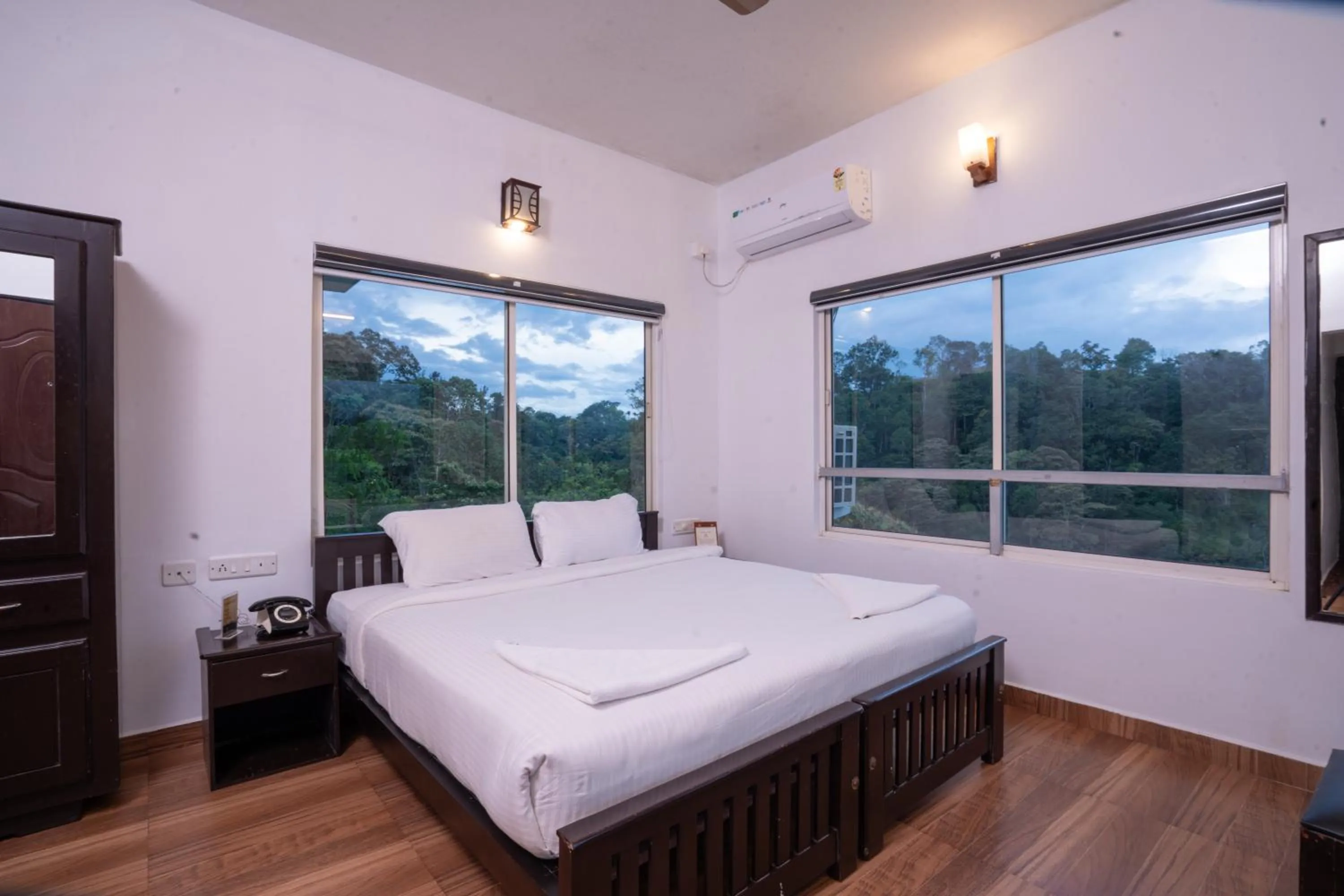 Bed in Eterno Camellia & Elettaria Resort with Pool