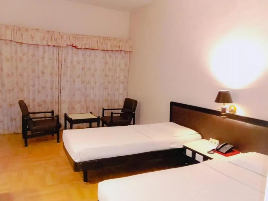 Bed in Hotel Indraprastha