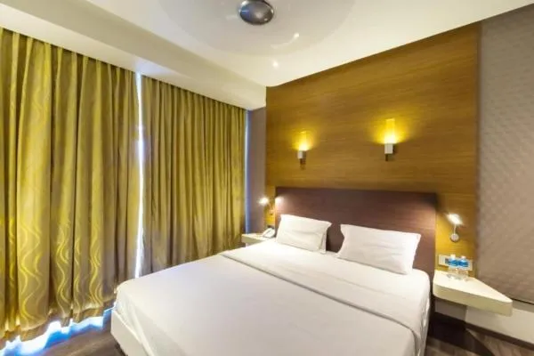 Bed in Hotel Indraprastha