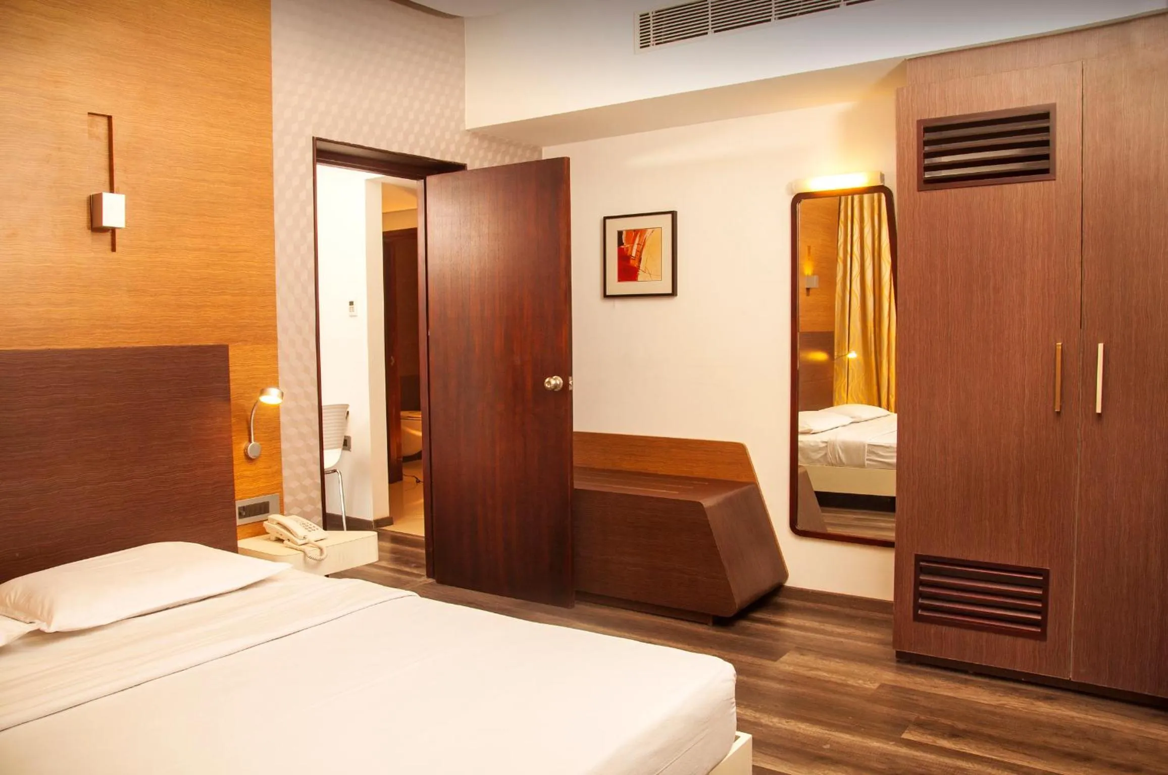 Bed in Hotel Indraprastha