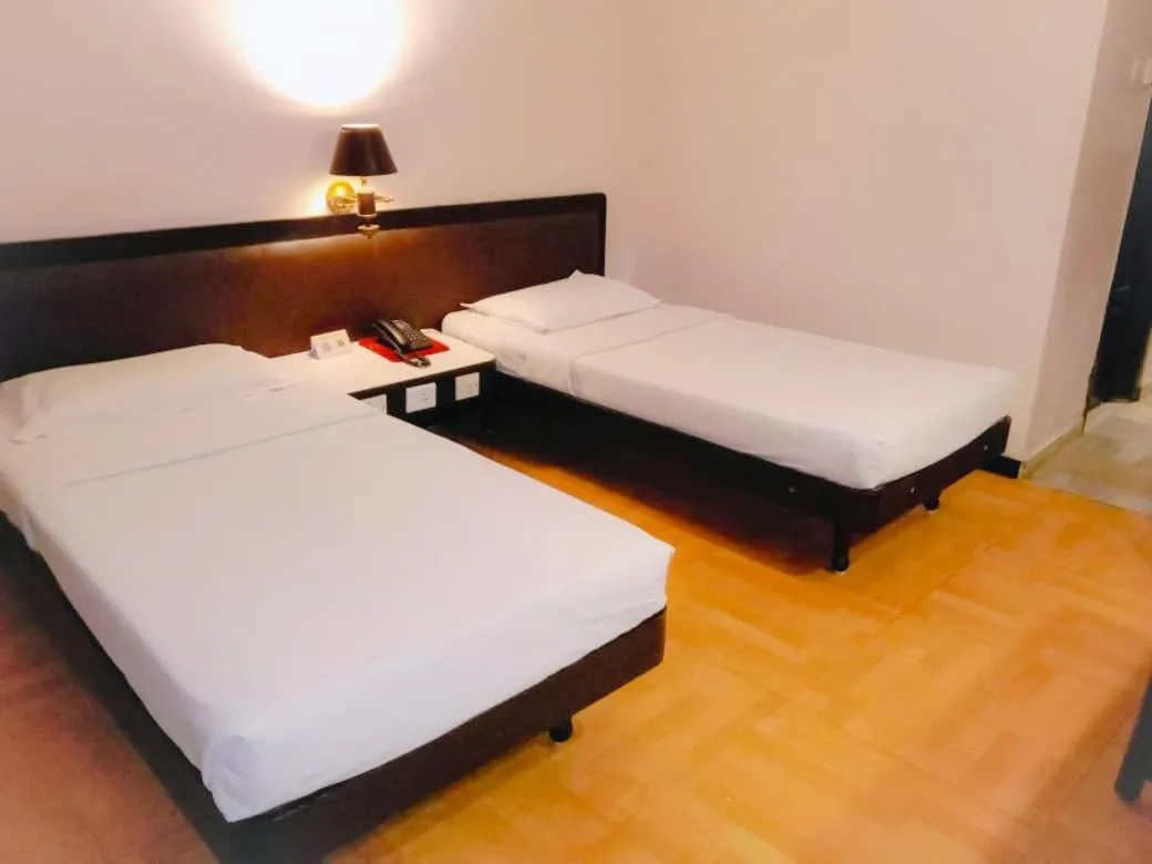 Bed in Hotel Indraprastha