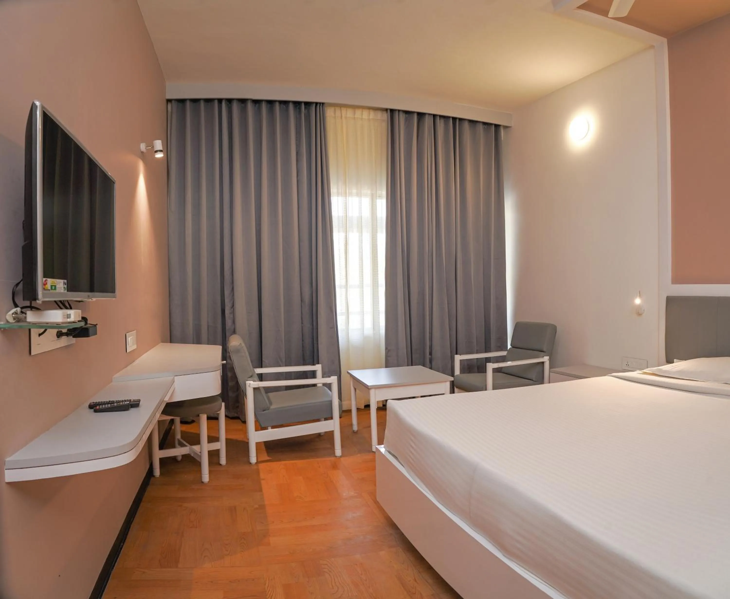 Bed in Hotel Indraprastha