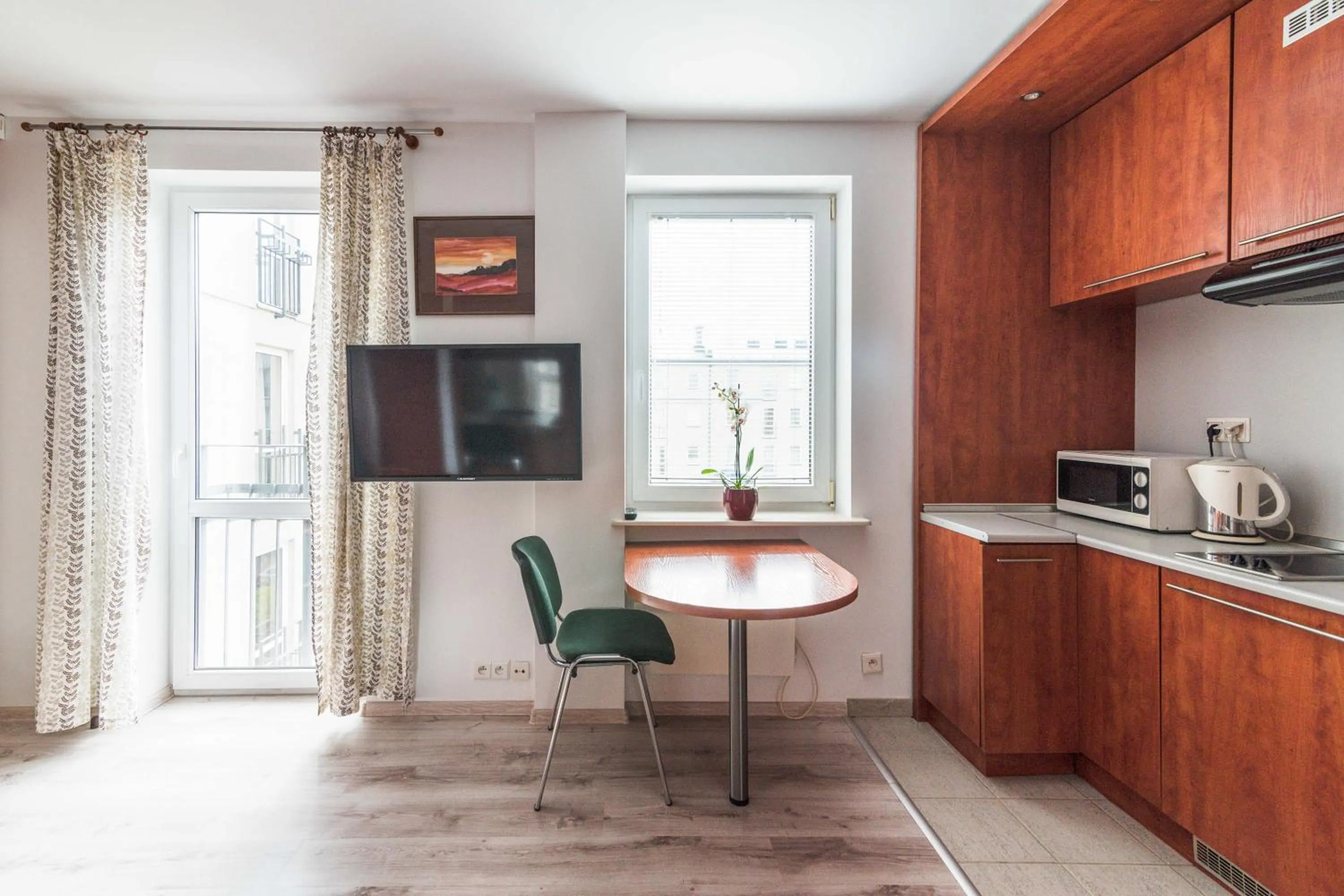 Kitchen or kitchenette in Warsaw Apartments Magnolie