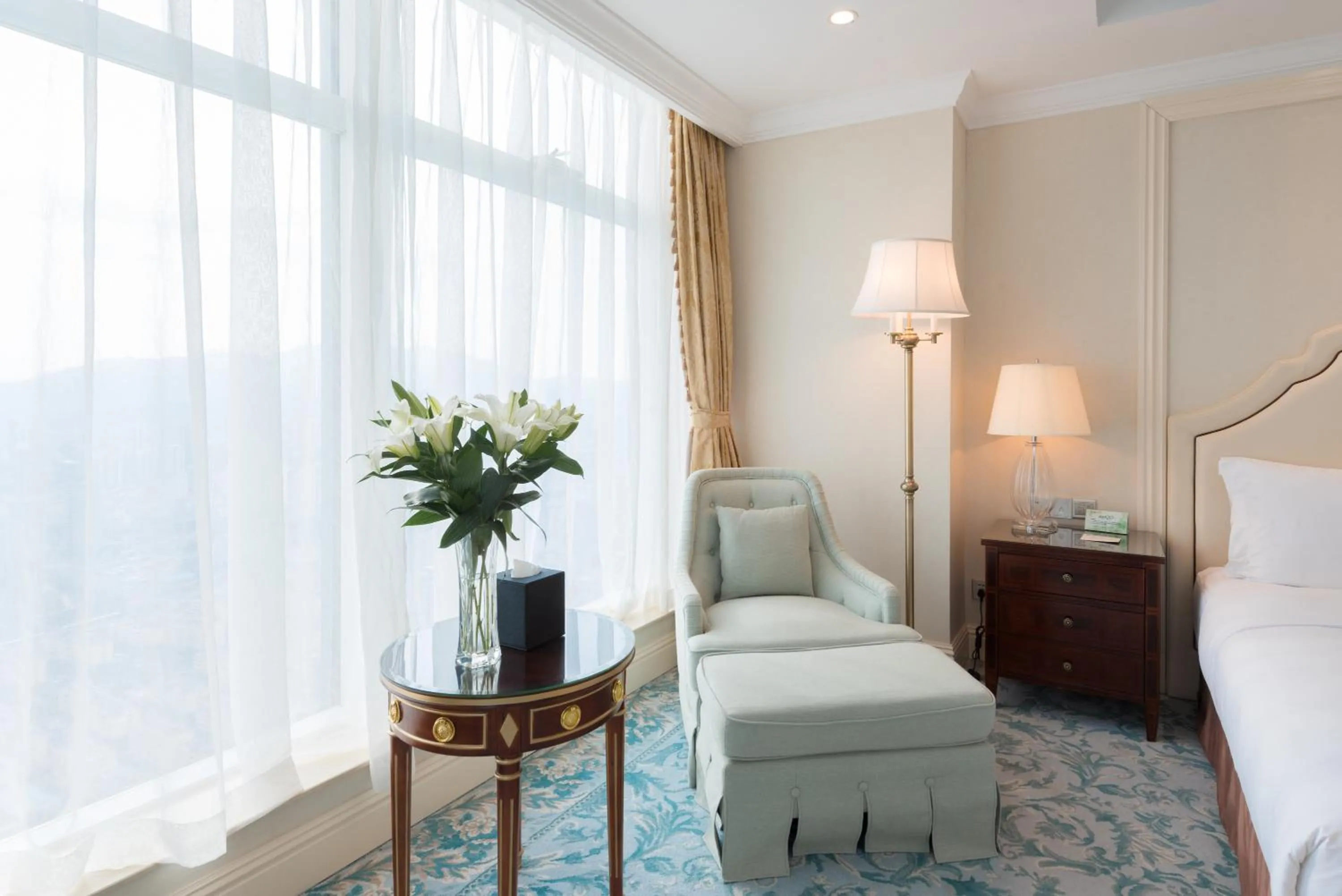 Seating area, Bed in Qingdao Jianxin International Hotel