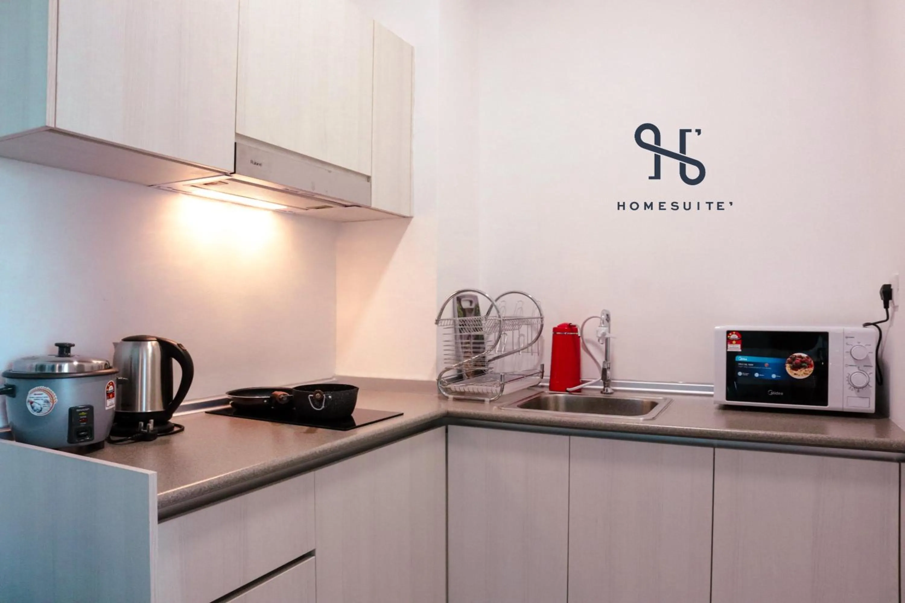 Kitchen or kitchenette in Homesuite' Home at Jesselton Quay