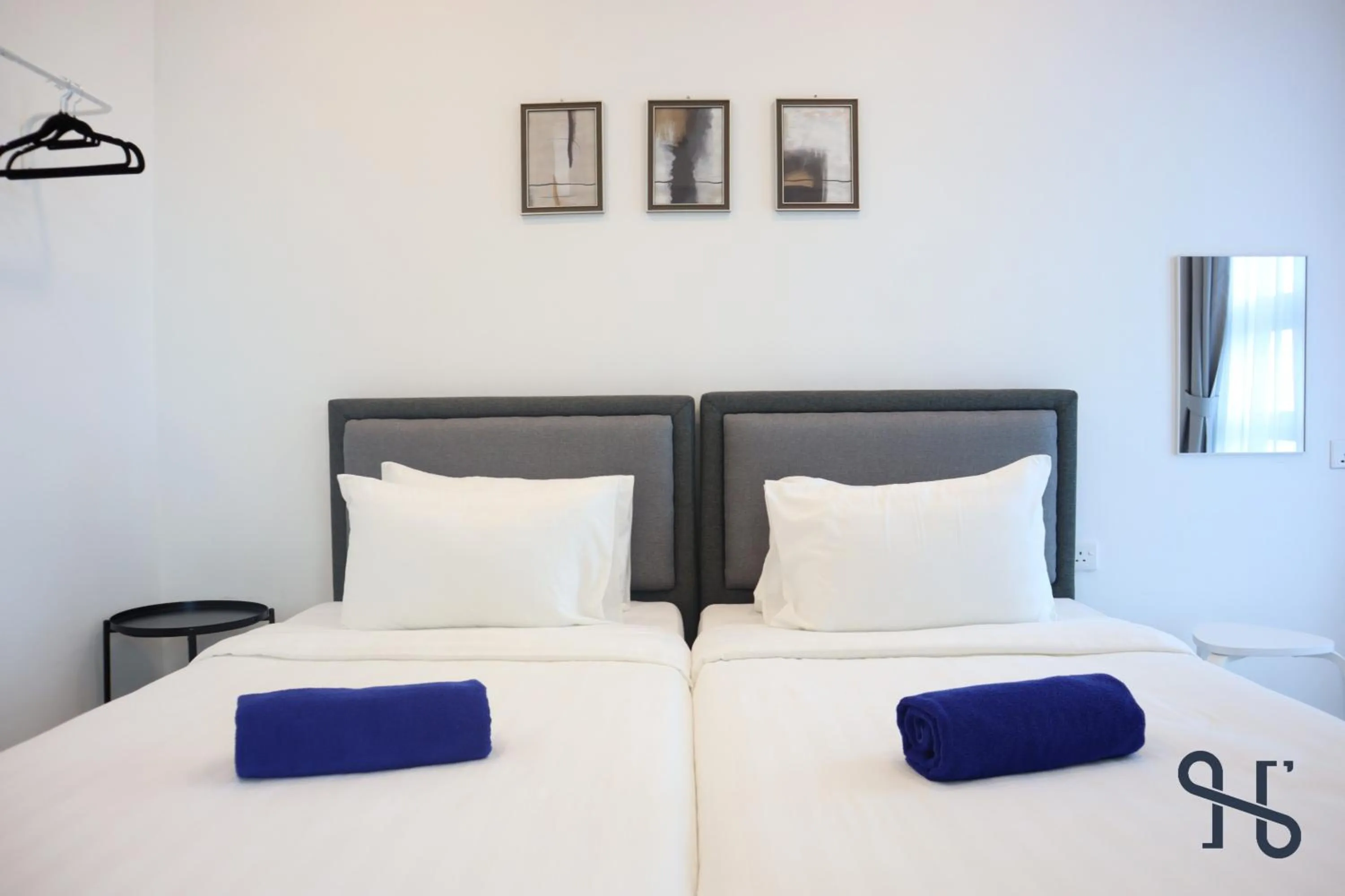 Bed in Homesuite' Home at Jesselton Quay