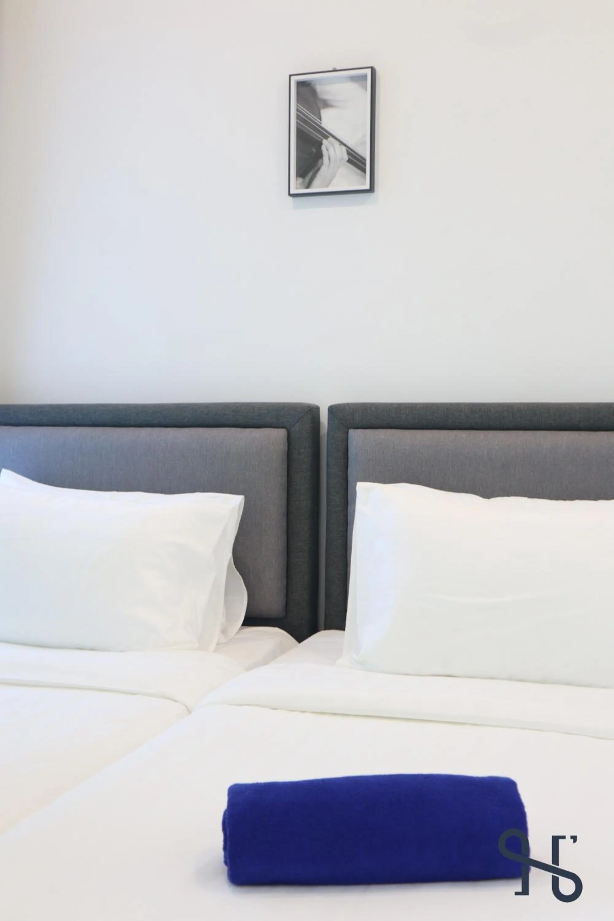 Bed in Homesuite' Home at Jesselton Quay