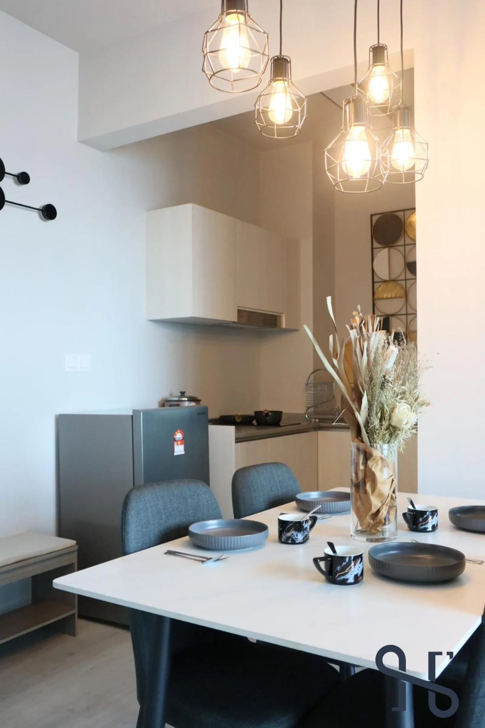 Kitchen or kitchenette in Homesuite' Home at Jesselton Quay