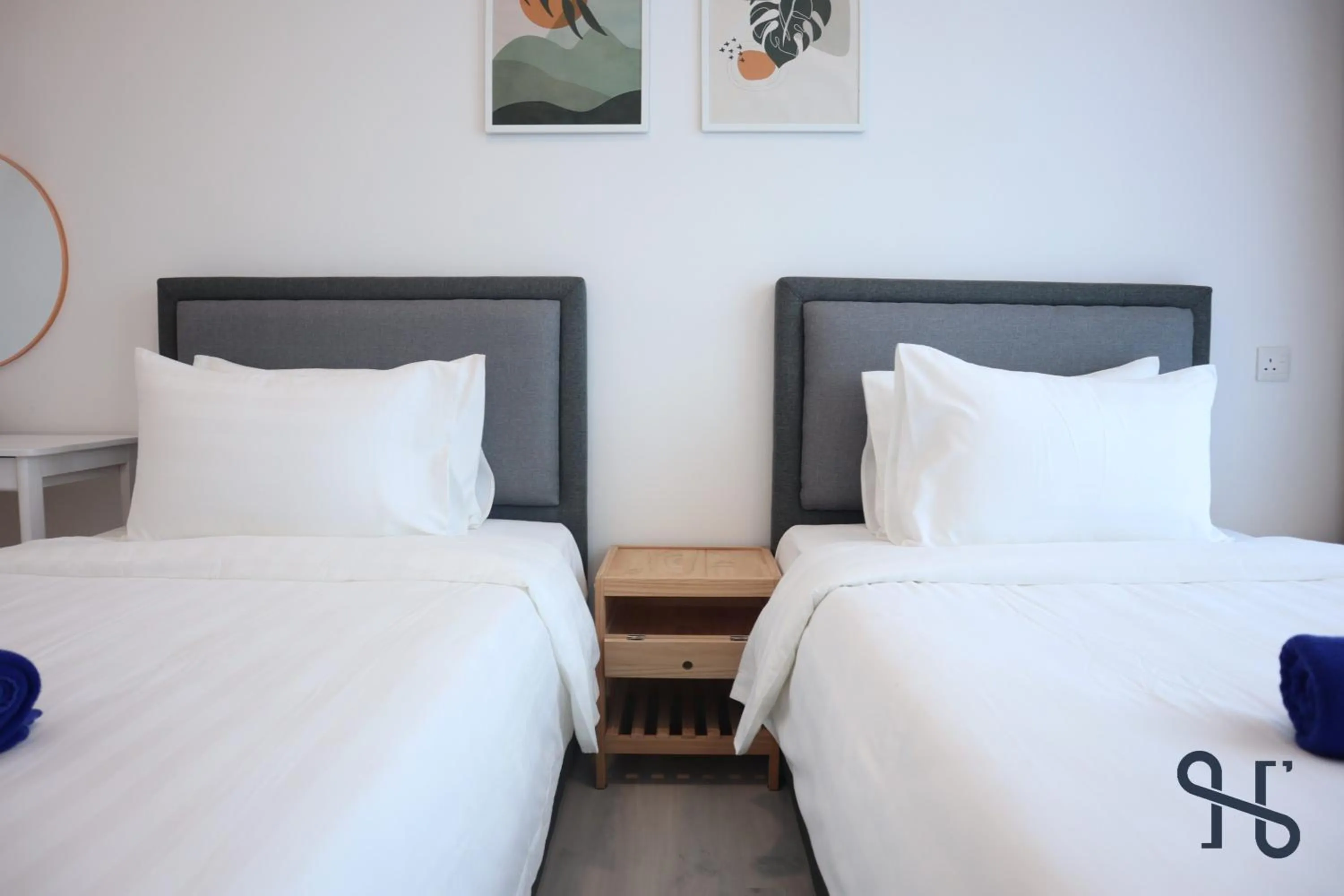 Bed in Homesuite' Home at Jesselton Quay