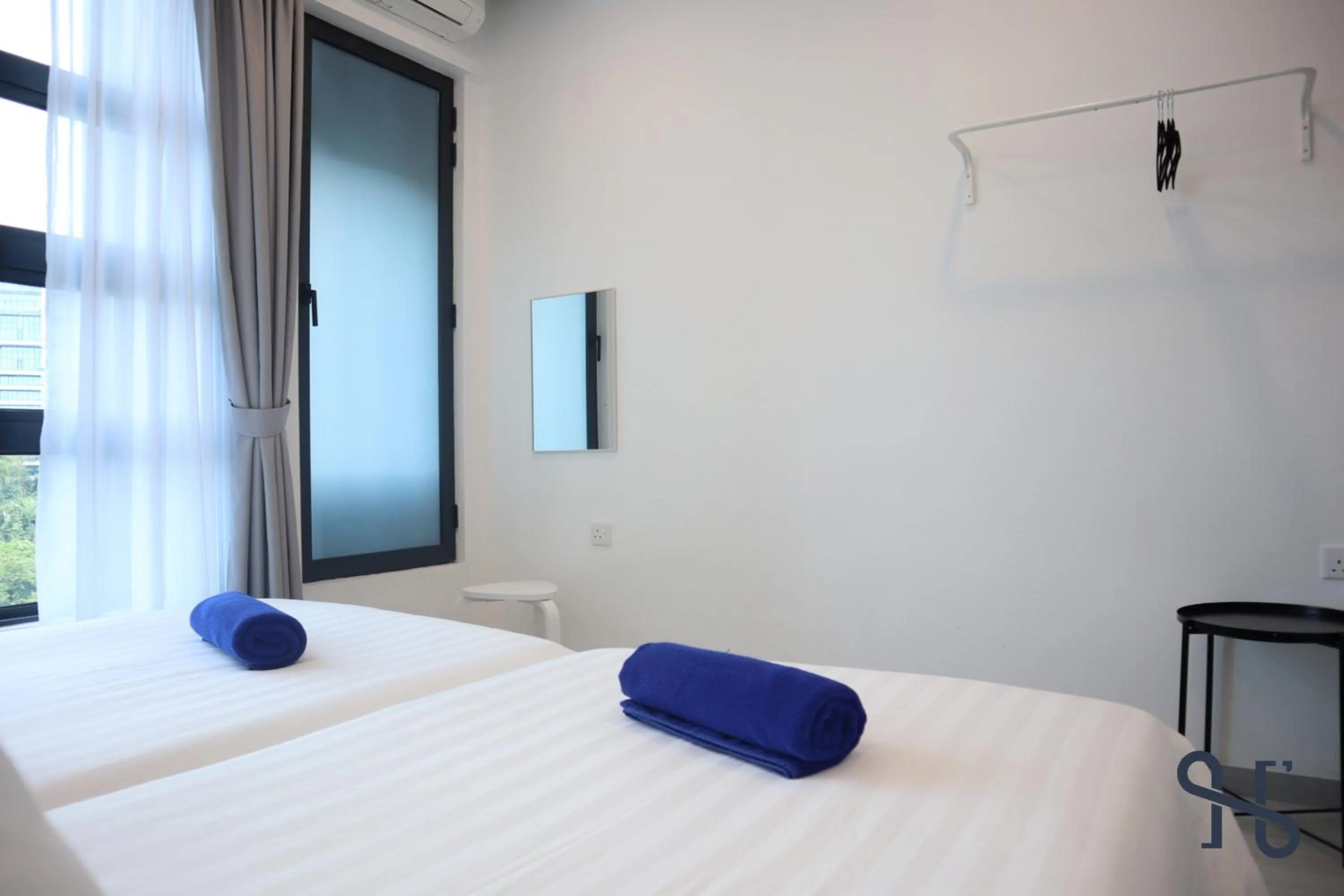 Bed in Homesuite' Home at Jesselton Quay