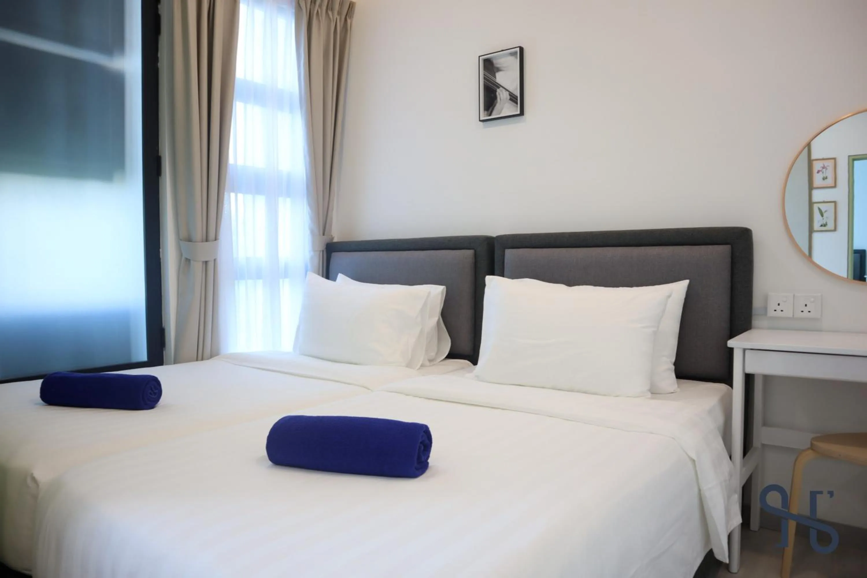 Bed in Homesuite' Home at Jesselton Quay