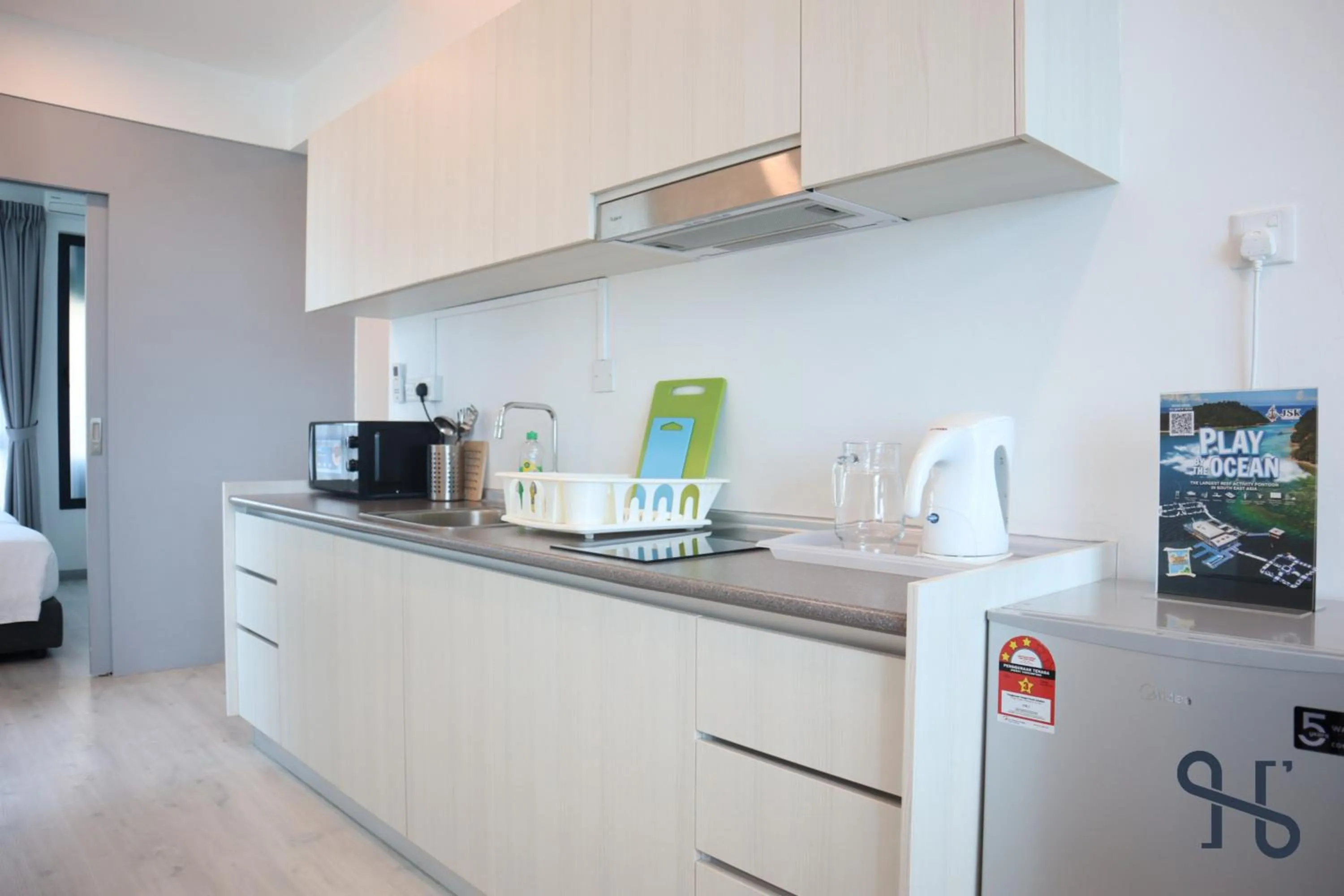 Coffee/tea facilities in Homesuite' Home at Jesselton Quay