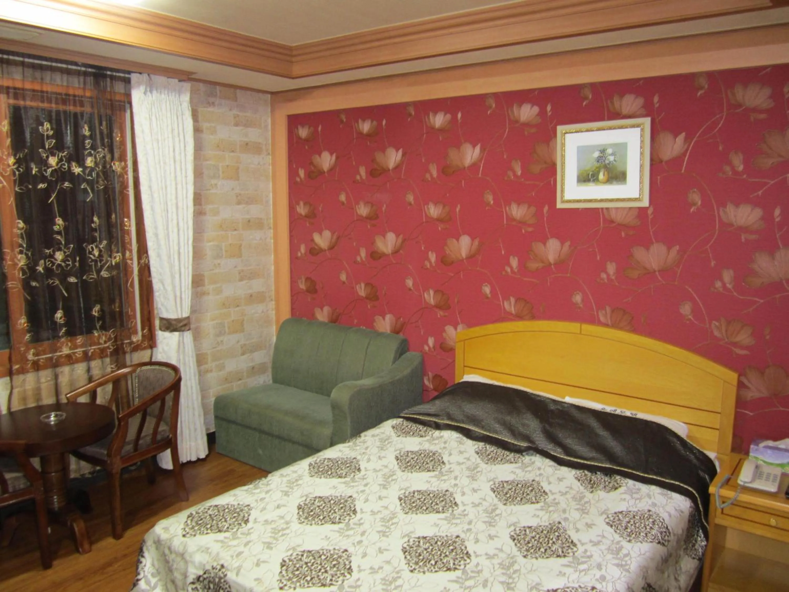 Bed in Jeju Olleh Hotel