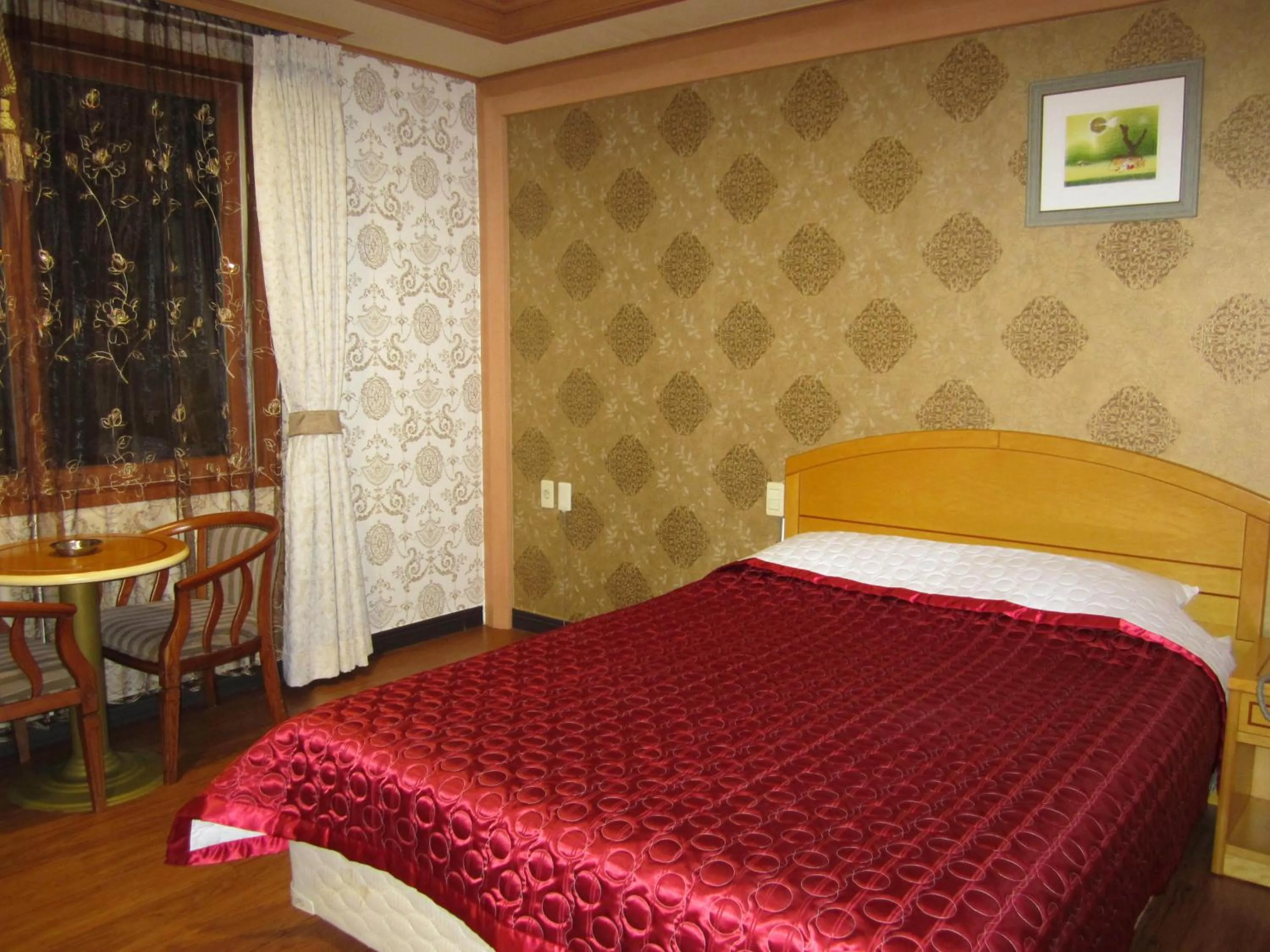 Bed in Jeju Olleh Hotel