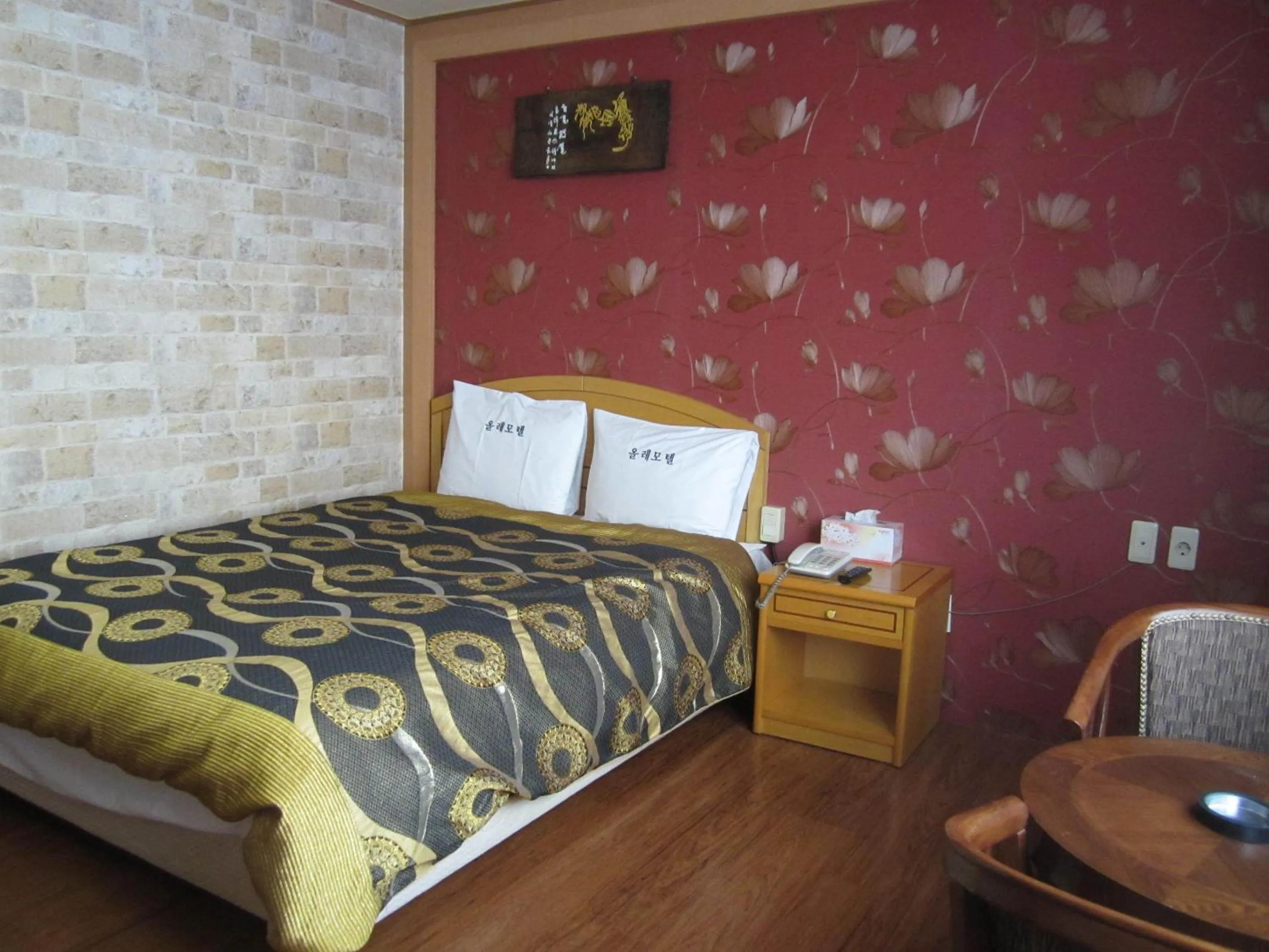 Bed in Jeju Olleh Hotel